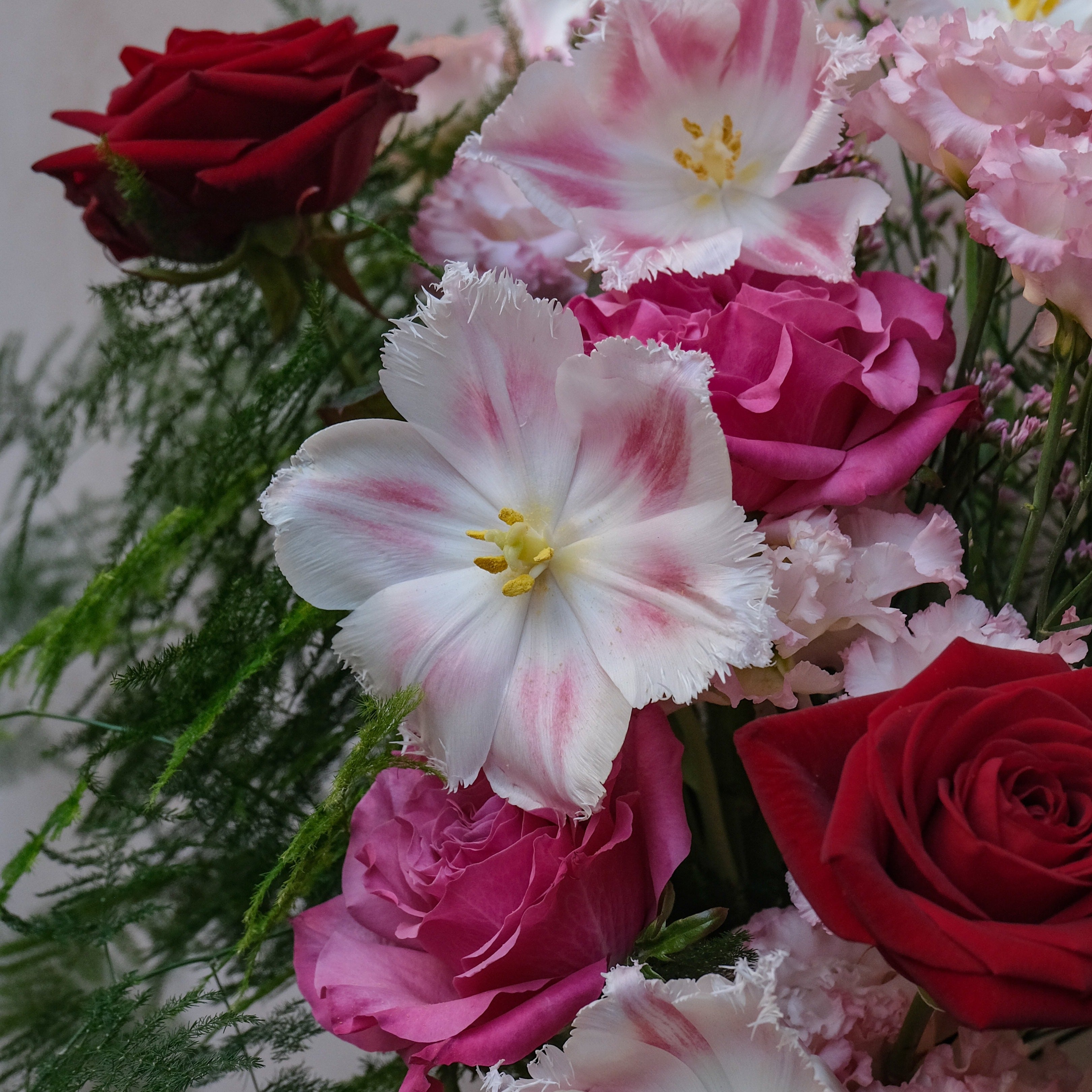 Valentine's Day gift set with red pink roses bouquet candle and jar of bath salts