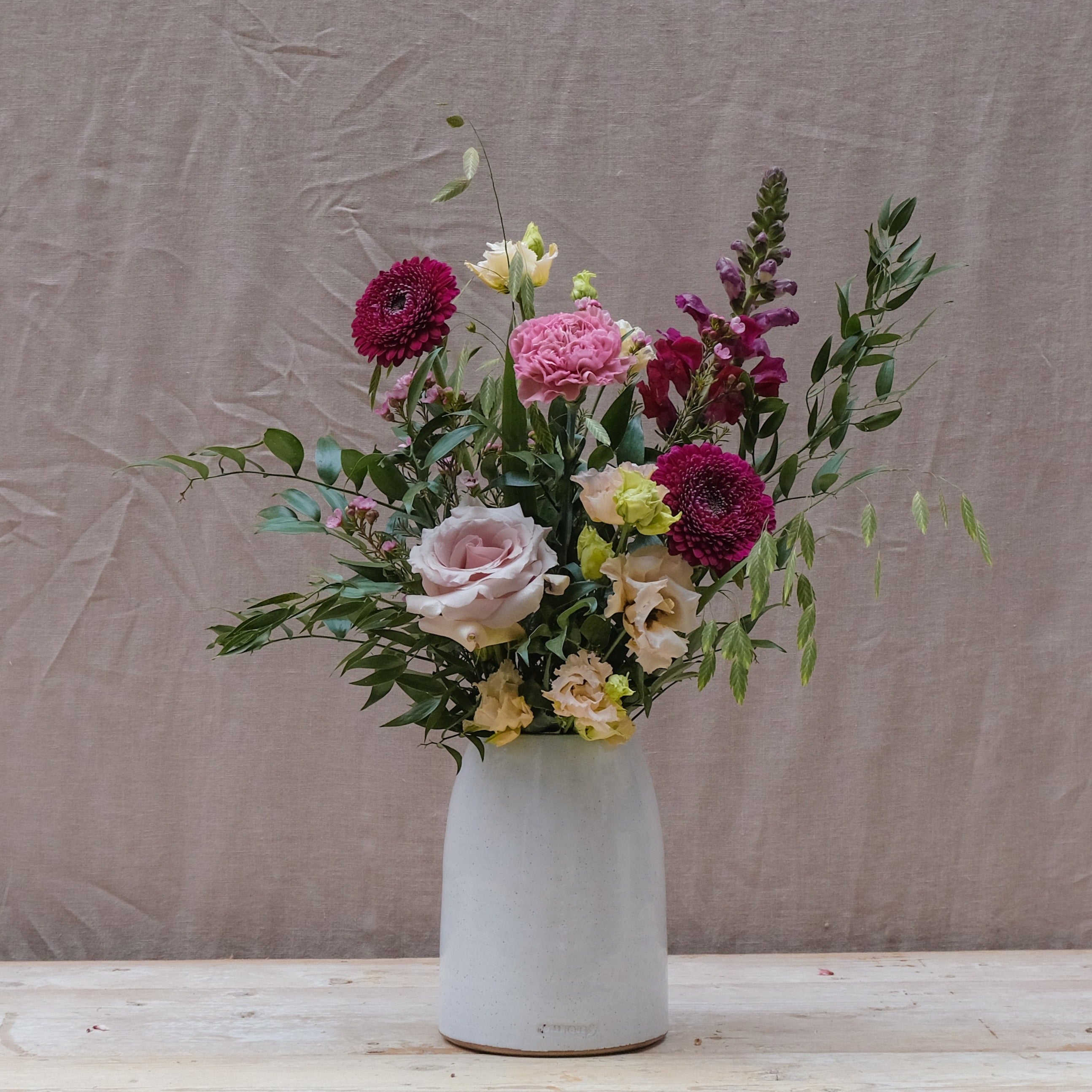 romantic bouquet with burgundy and pink flowers