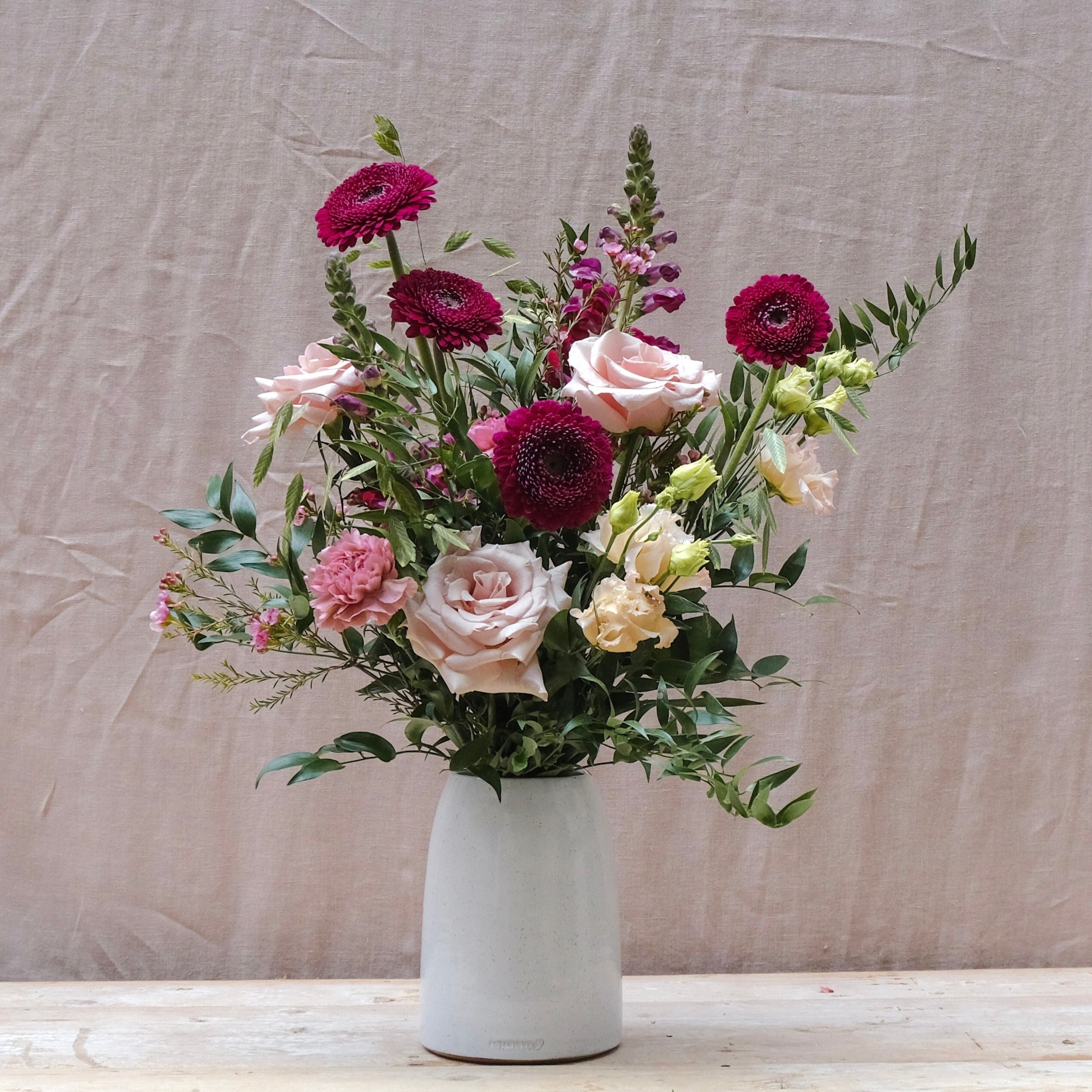 romantic bouquet with burgundy and pink flowers