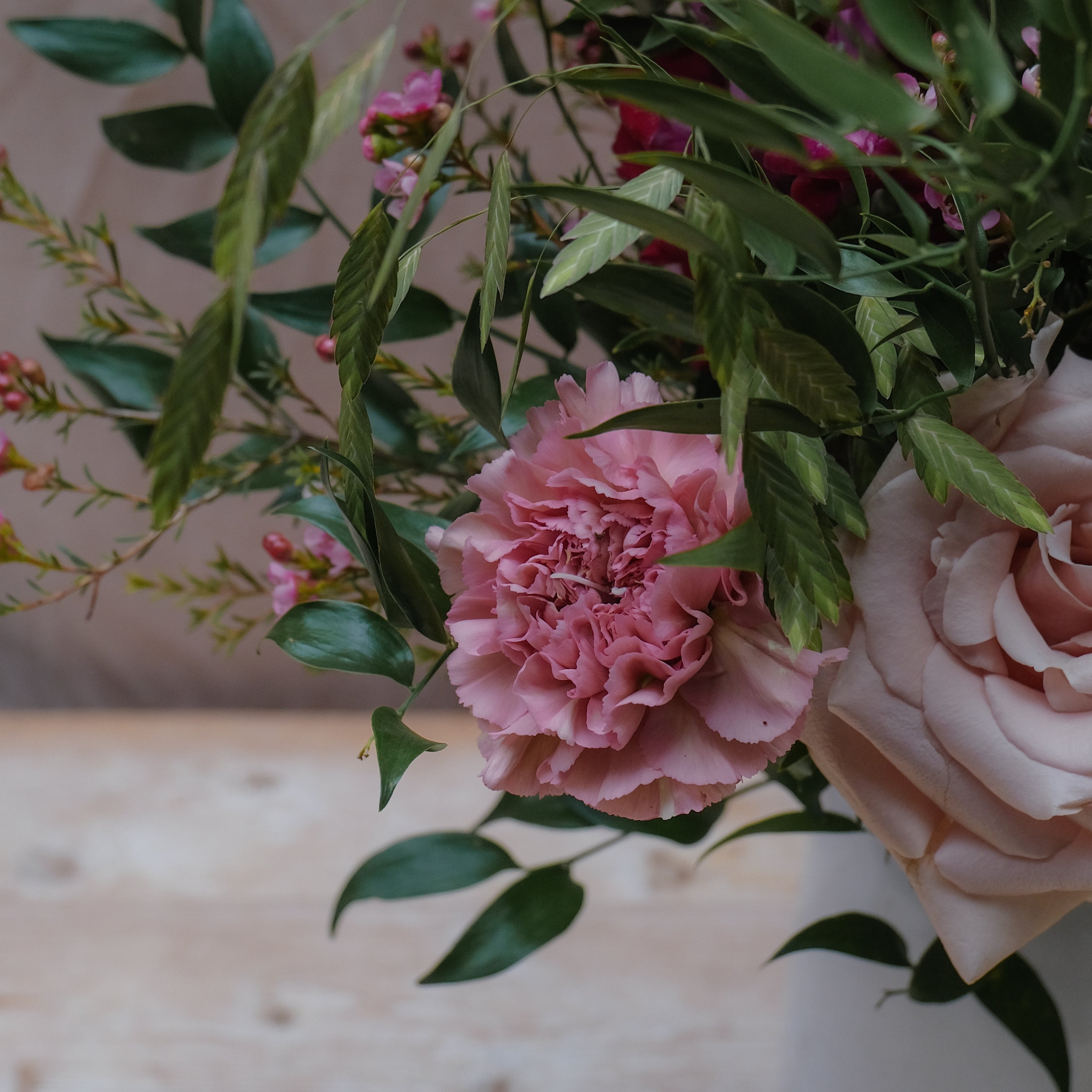 romantic bouquet with burgundy and pink flowers