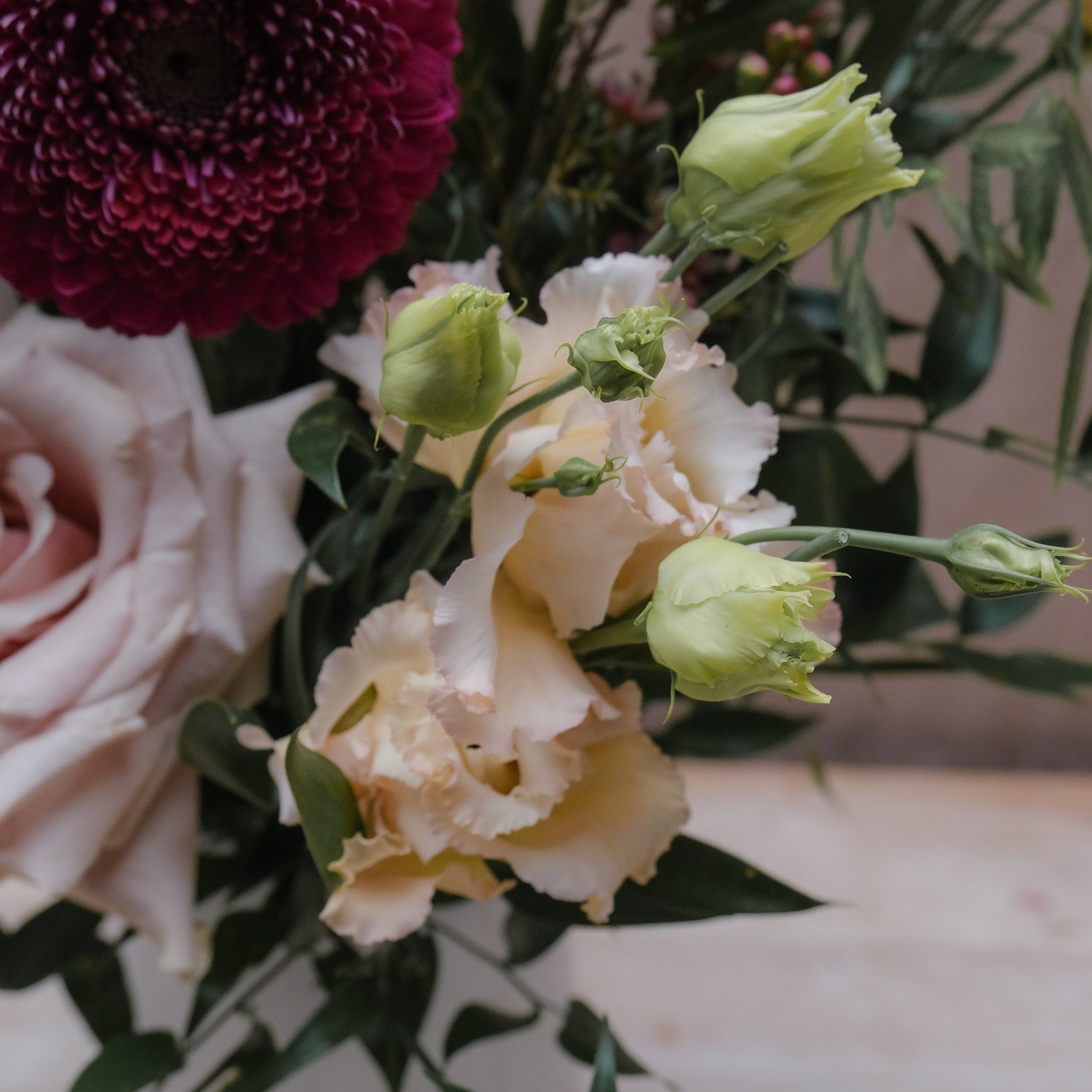 fresh flower bouquet with burgundy and soft pink flowers