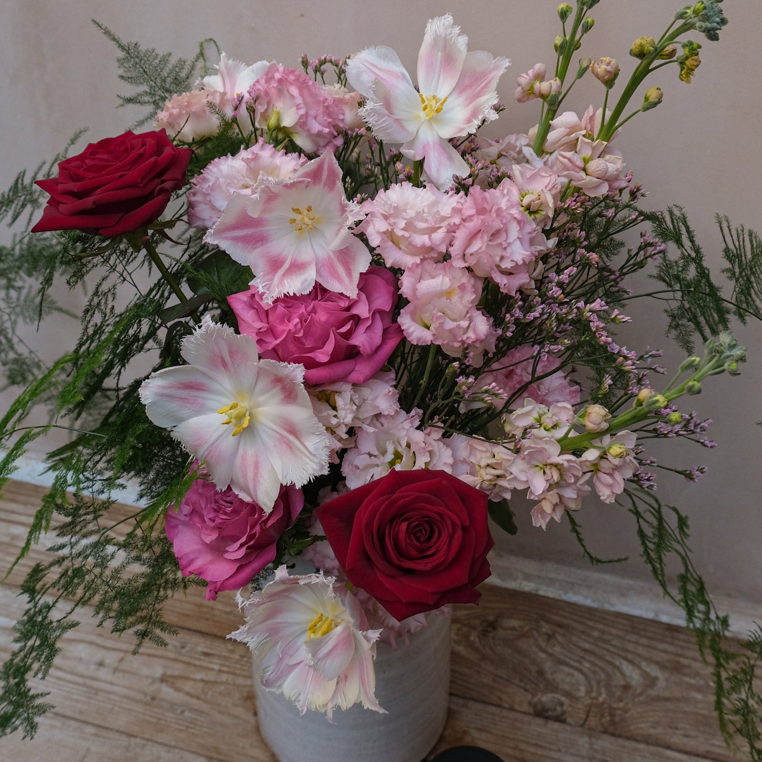 Valentine's Day gift set with red pink roses bouquet candle and jar of bath salts