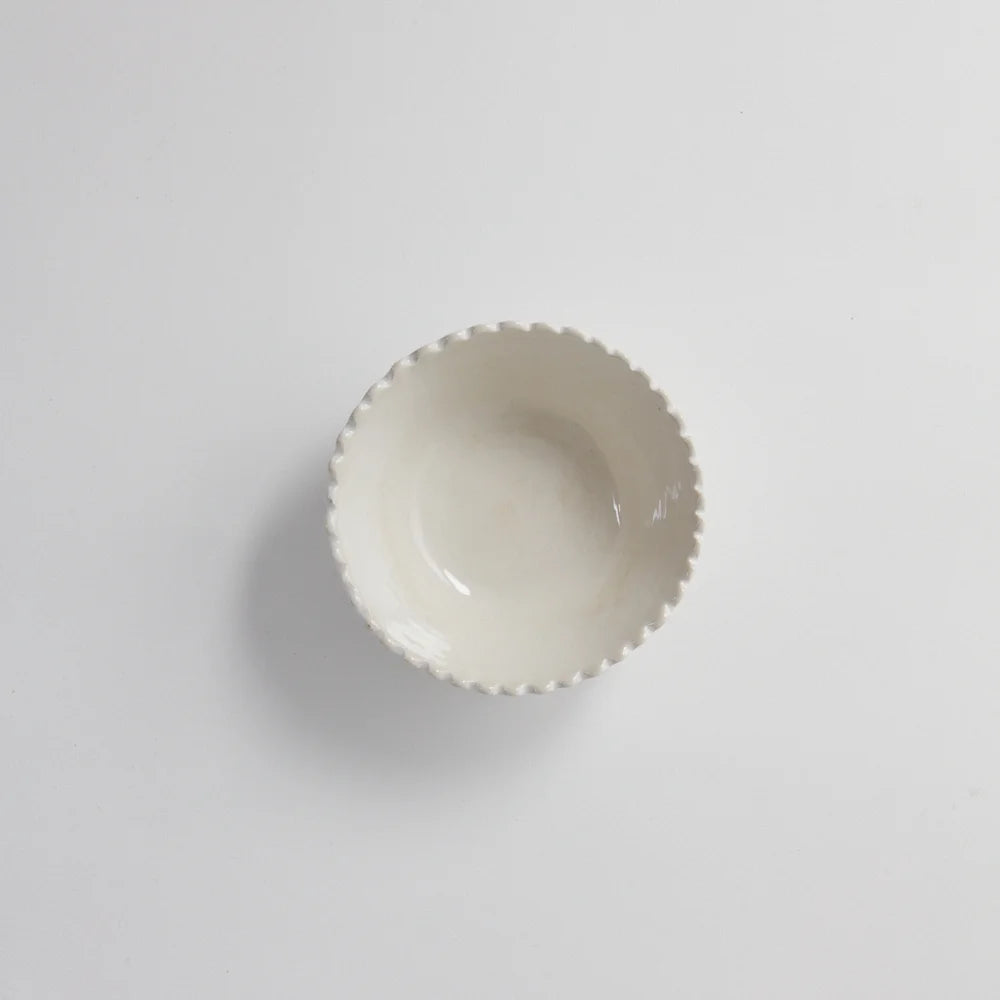 White breakfast bowl with scalloped detail