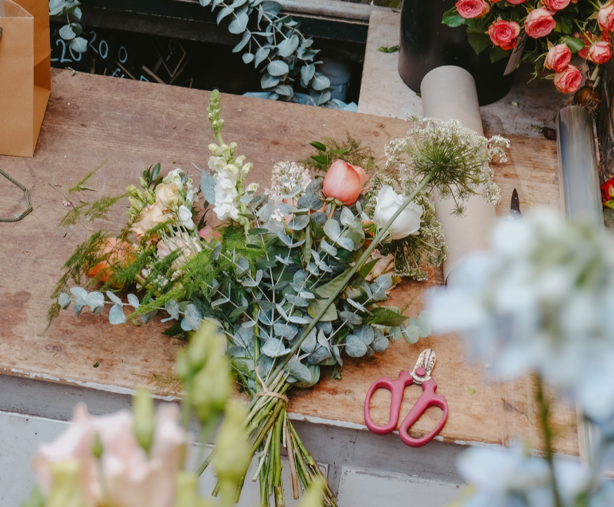 a bouquet of hand-tied flowers at a flower workshop in london