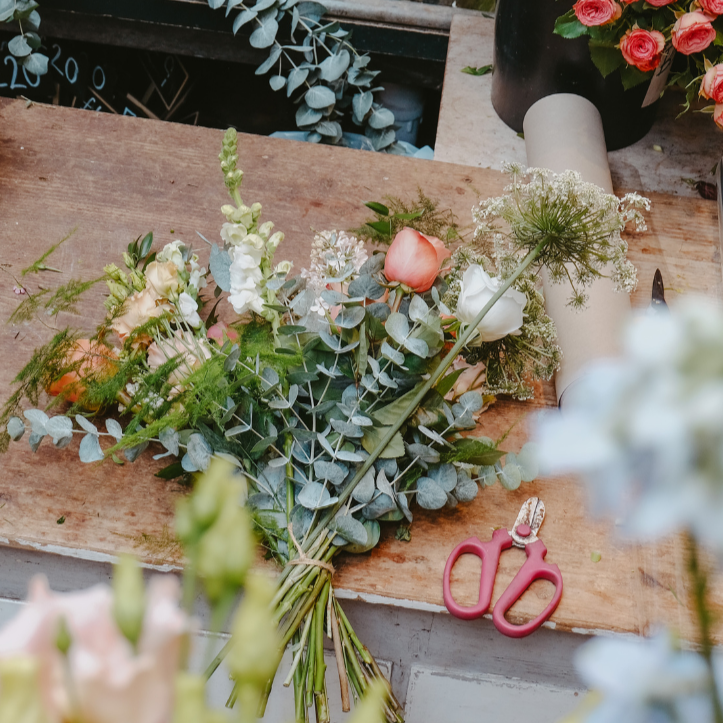 a bouquet of hand-tied flowers at a flower workshop in london