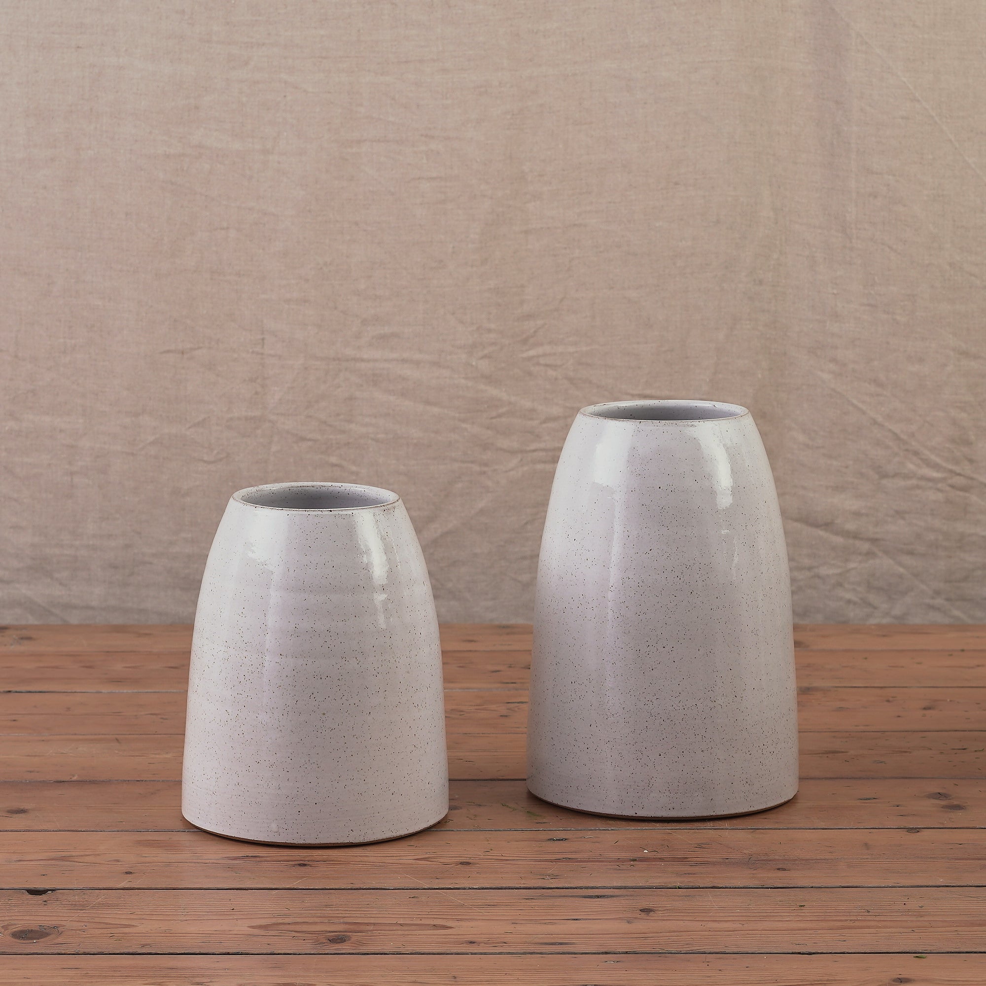 white hand thrown ceramic vase with speckled finish