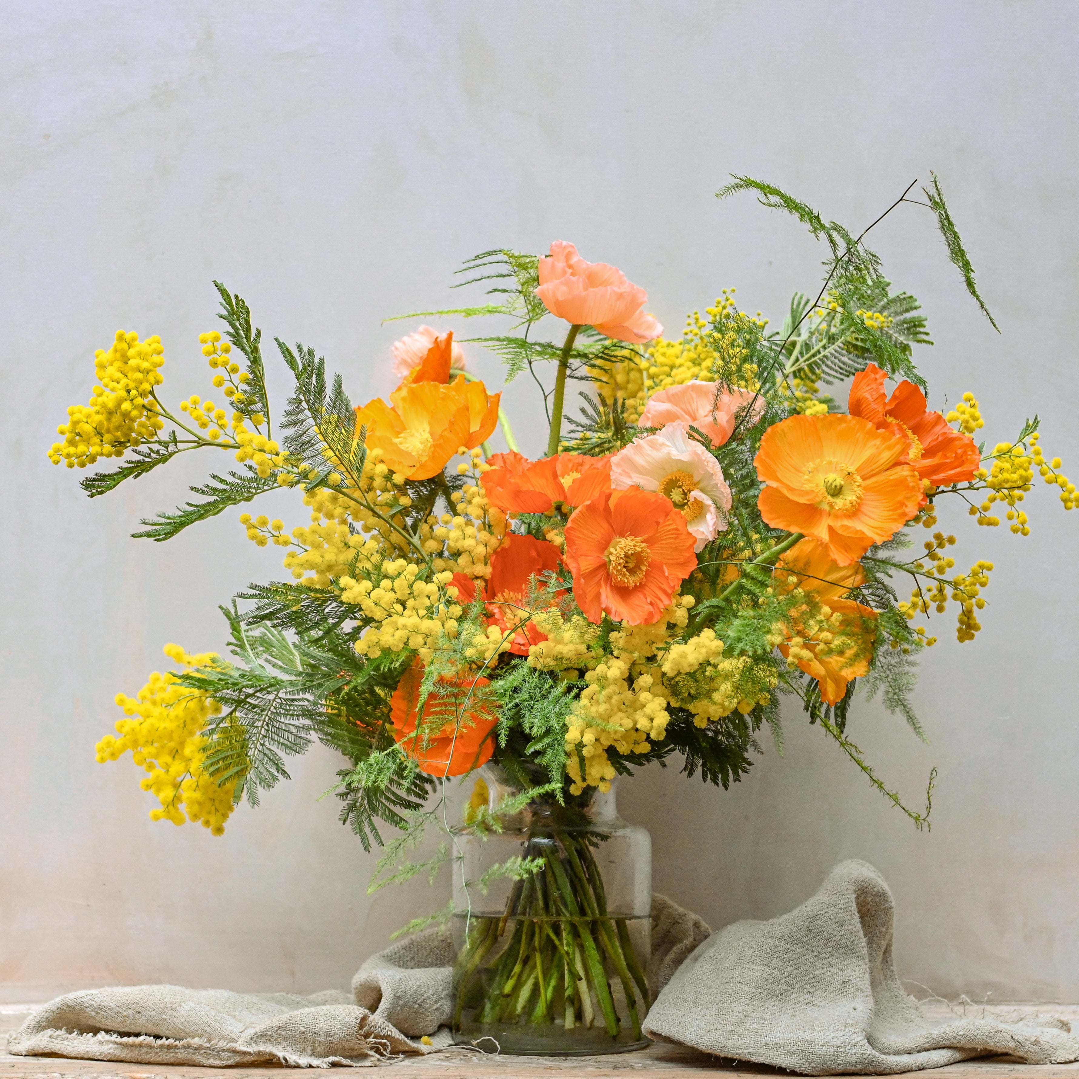 icelandic poppies and mimosa fresh flowers bouquet available for London & UK flower delivery