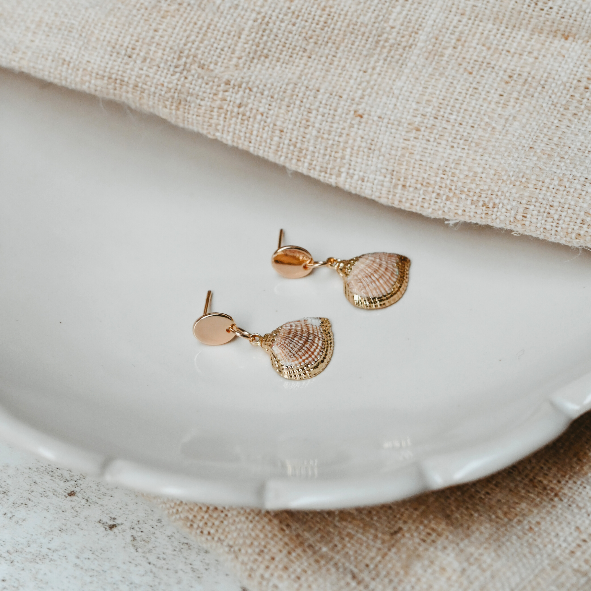 Cosmos Studio by Botanique Workshop natural and golden shell earrings