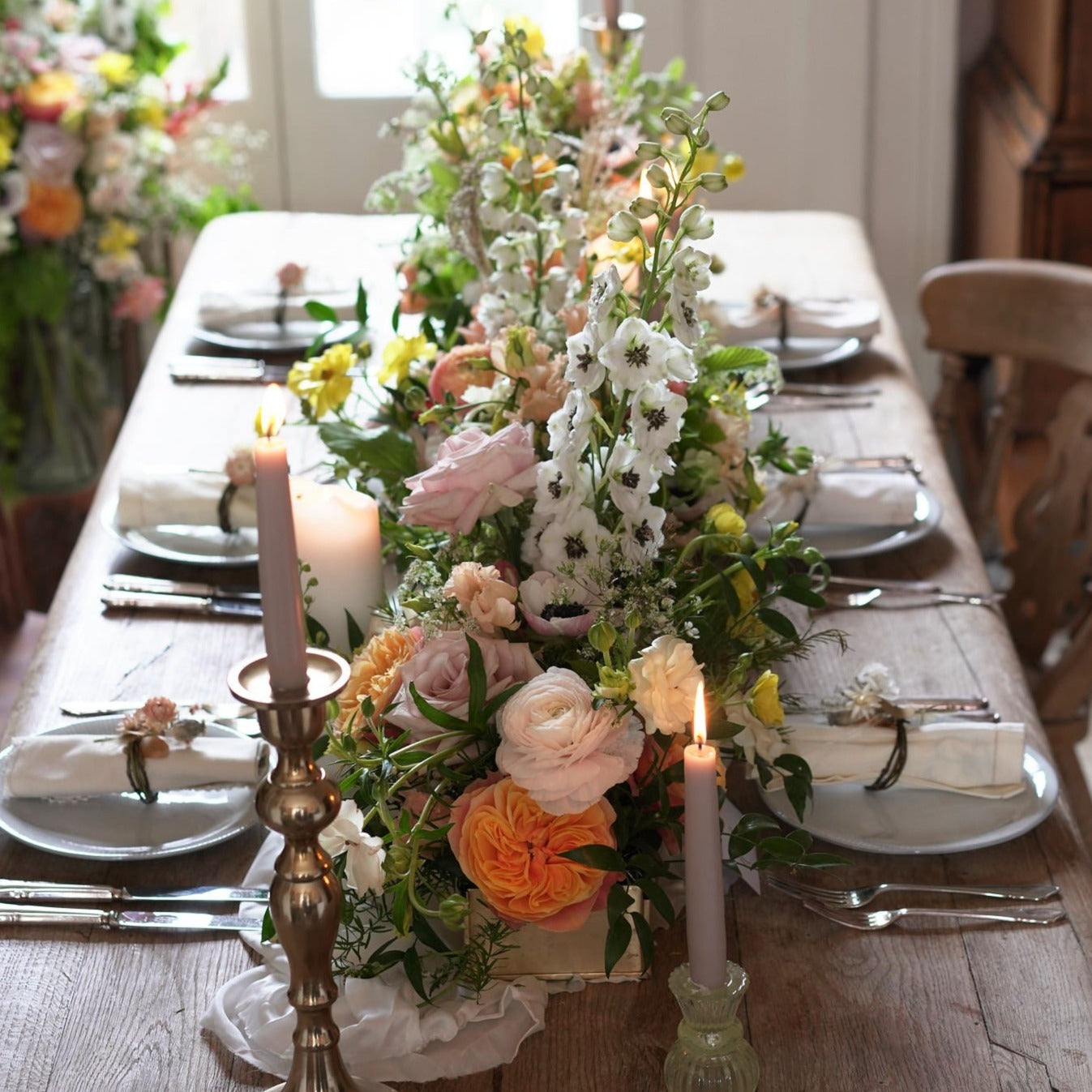 midsummer bloom trough arrangement with vibrant and fresh flowers for weddings and events