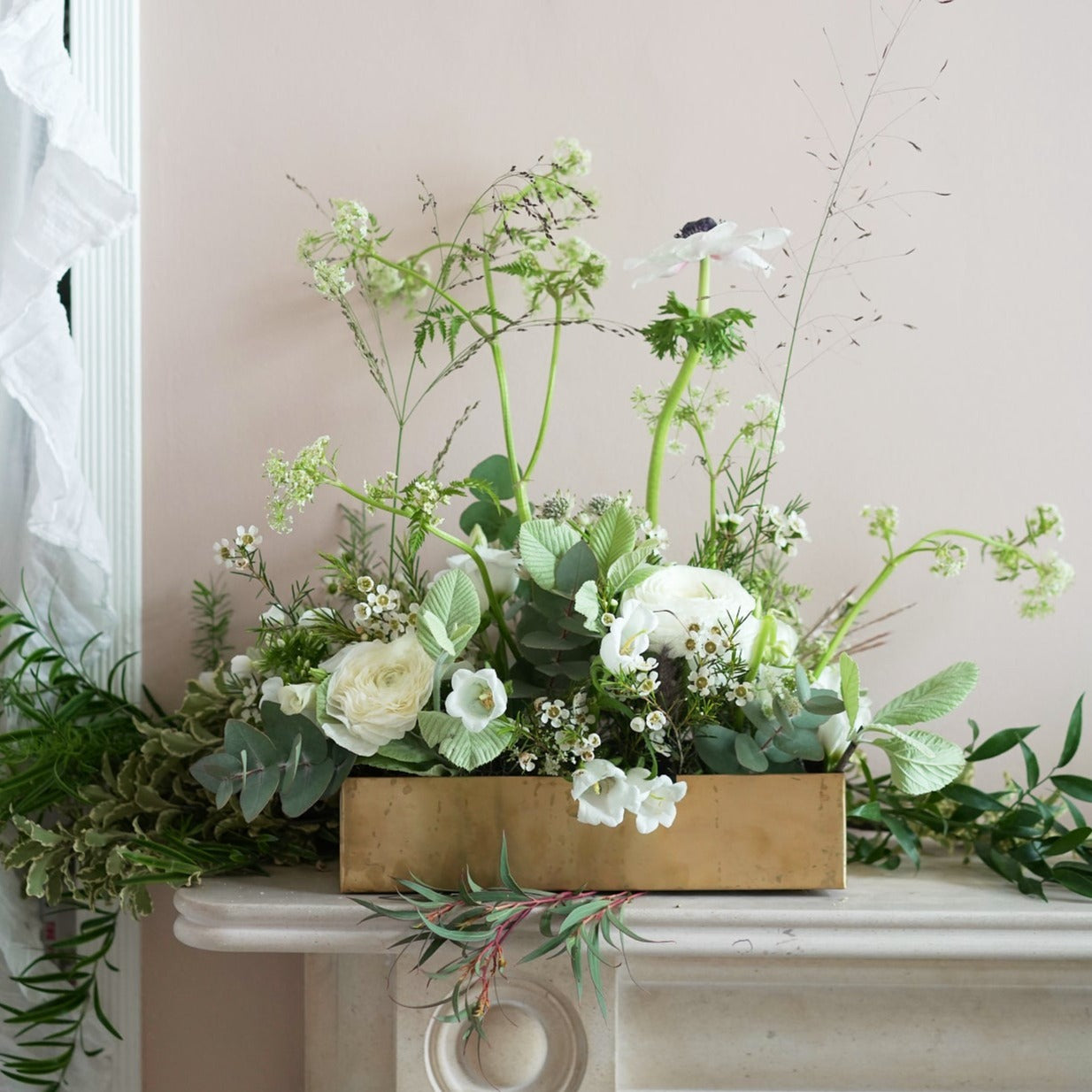 classic white wedding flowers through arrangement to decorate wedding venue by Botanique Workshop