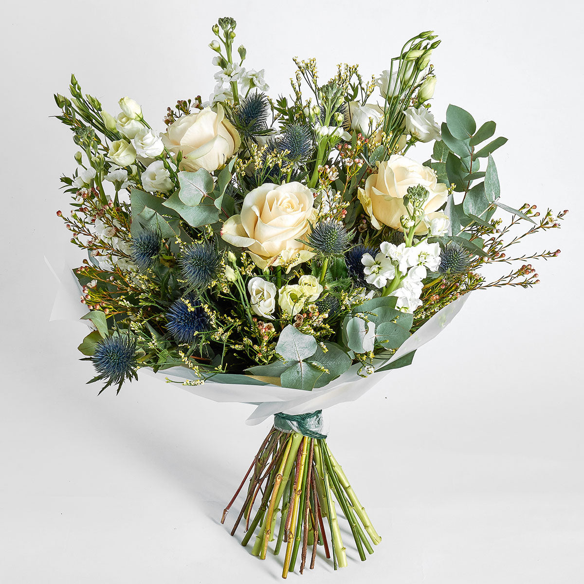 classic white bouquet with white roses and eucalyptus for delivery in London and UK Nationwide