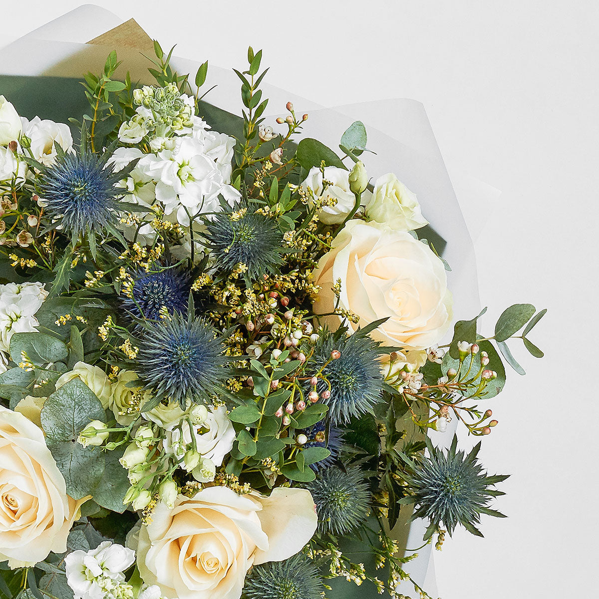 classic white bouquet with white roses and eucalyptus for delivery in London and UK Nationwide