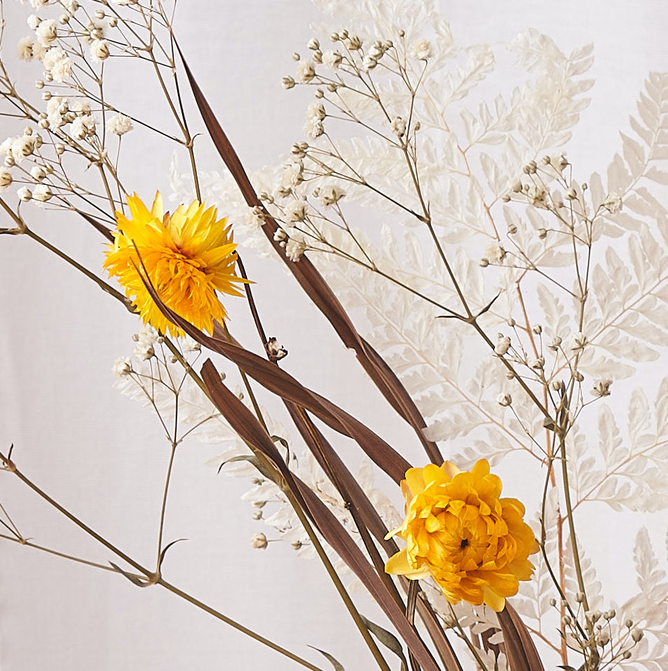 Sun Beam: bleached fern, white gyp and yellow straw flower