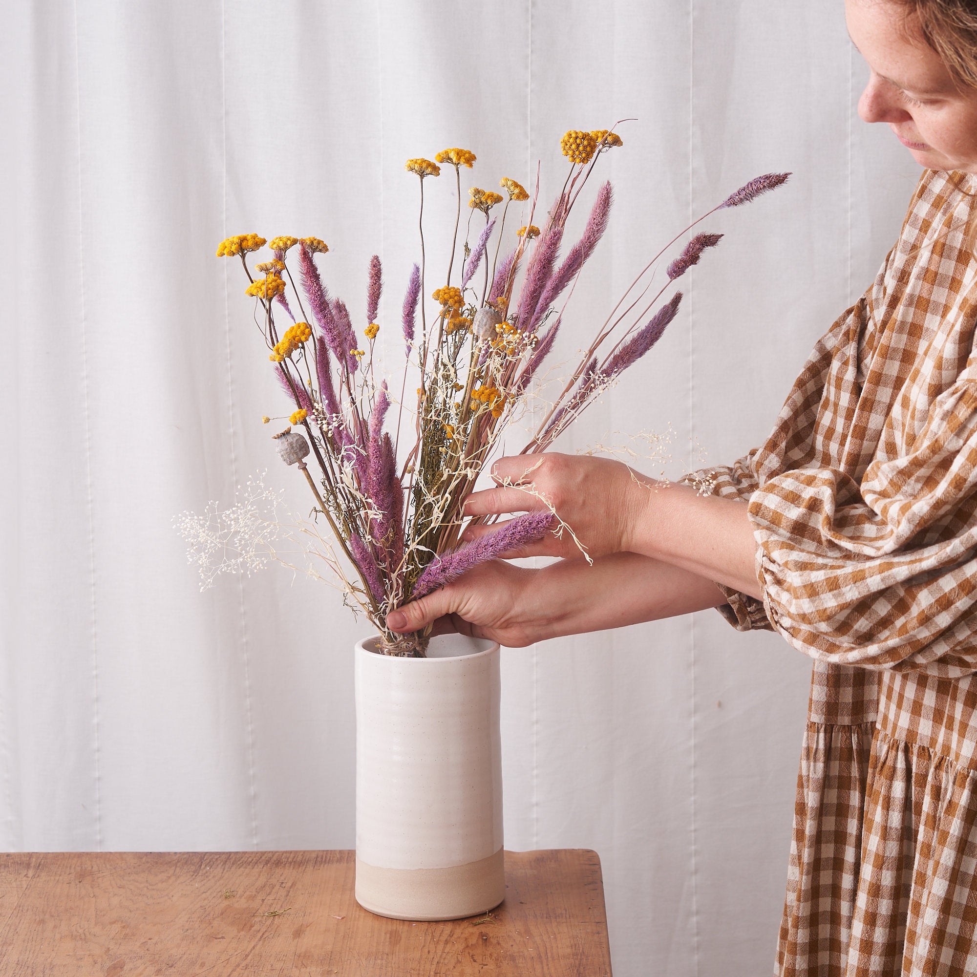 preserved bunch of dried flowers with yellow and pink