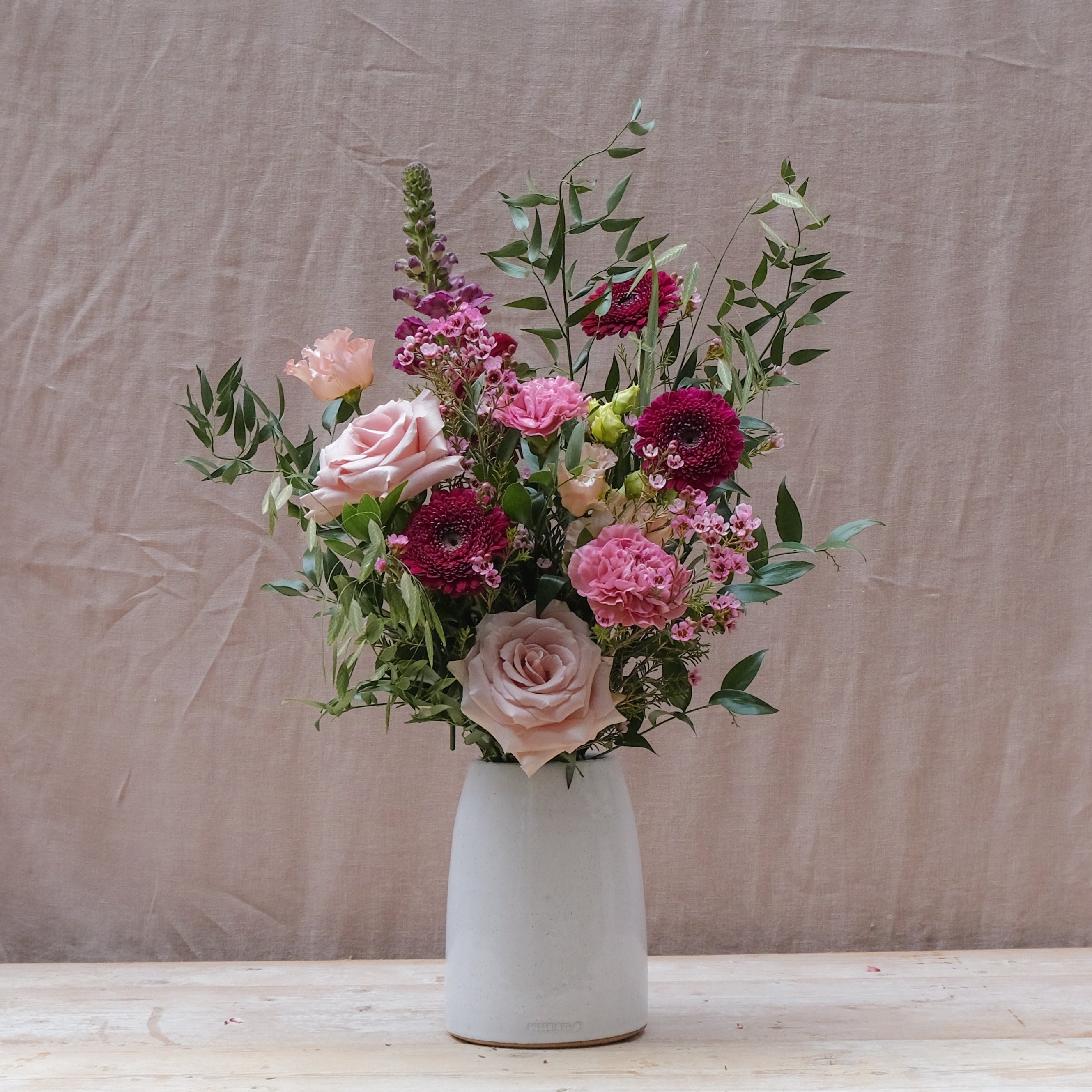 romantic bouquet with burgundy and pink flowers