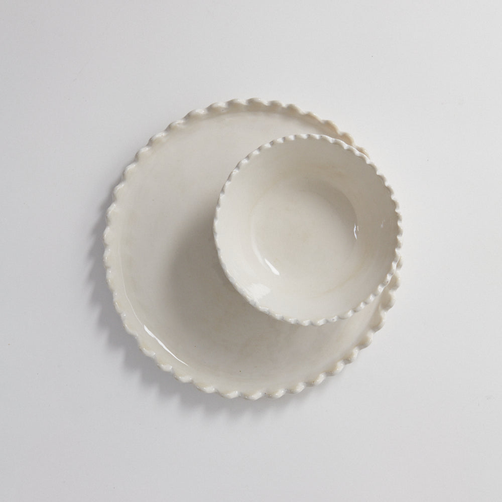 White breakfast bowl with scalloped detail