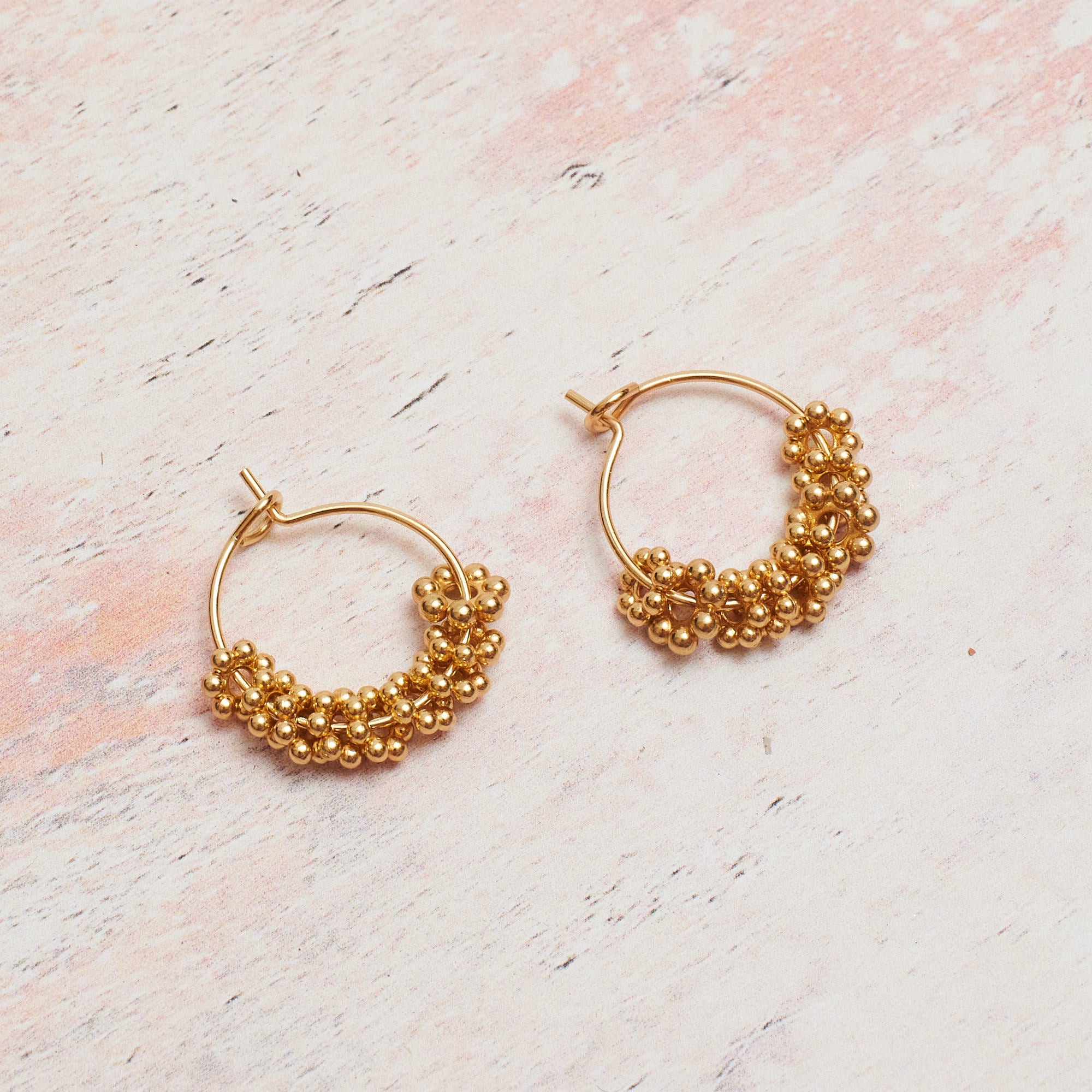 Gold Plated Hoop Earring with Beaded Daisies in Gold