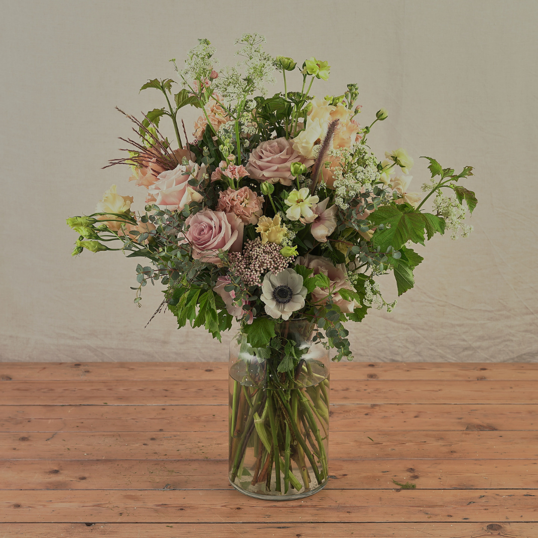 english country style vase arrangements for weddings in dusty pink colour palette