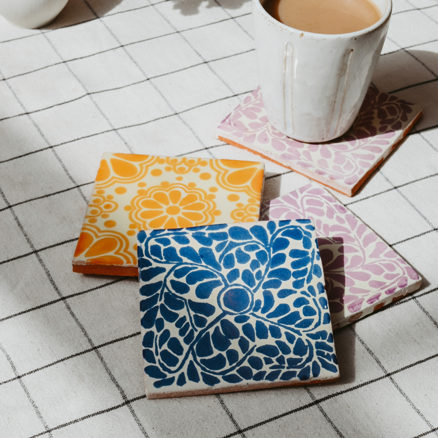 mexican style coasters in yellow pink and blue