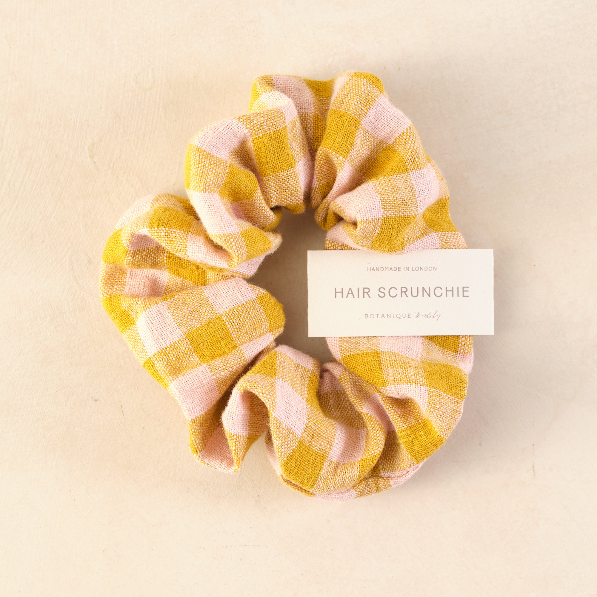handmade linen scrunchie in yellow and pink gingham design
