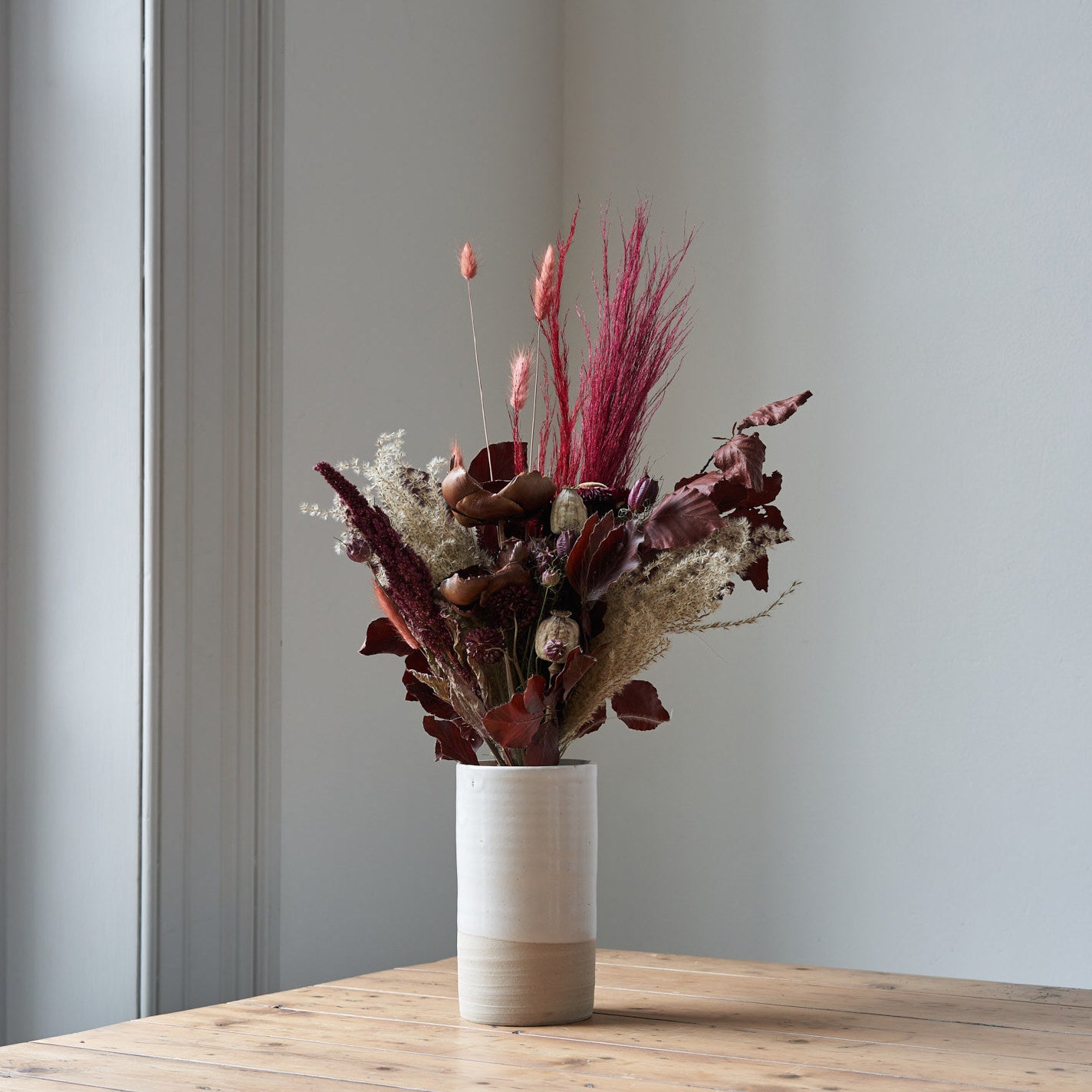 red and purple dried flower bouquet by Botanique Workshop London