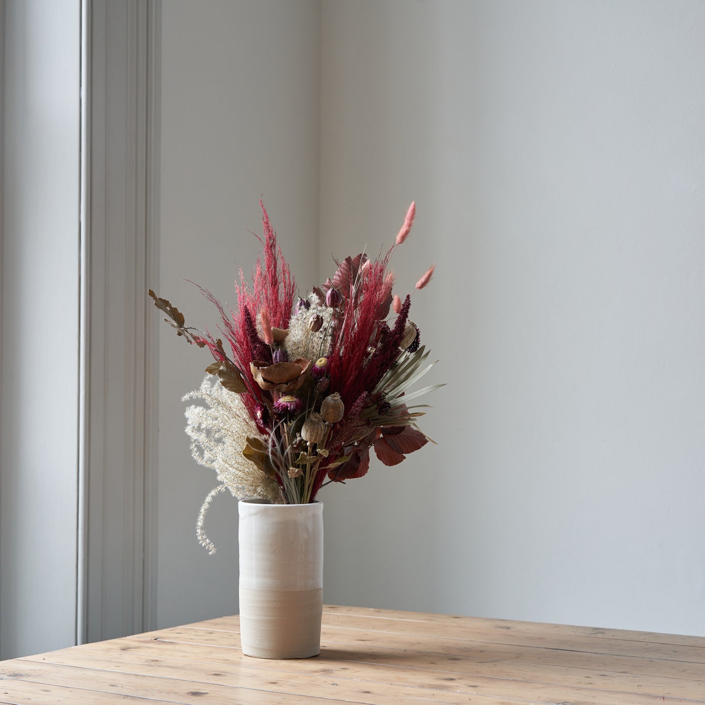red and purple dried flower bouquet by Botanique Workshop London