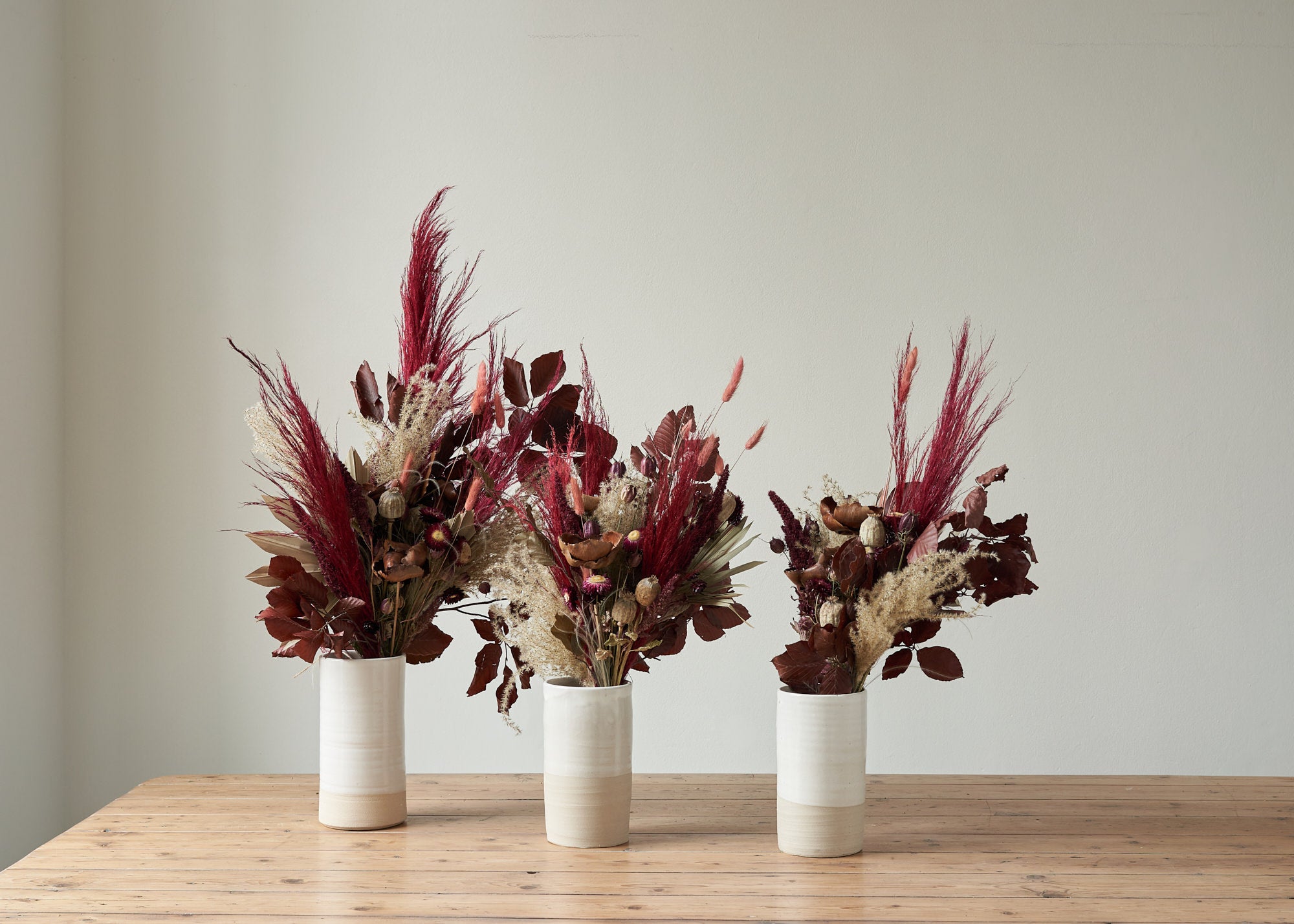 red and purple dried flower bouquet by Botanique Workshop London