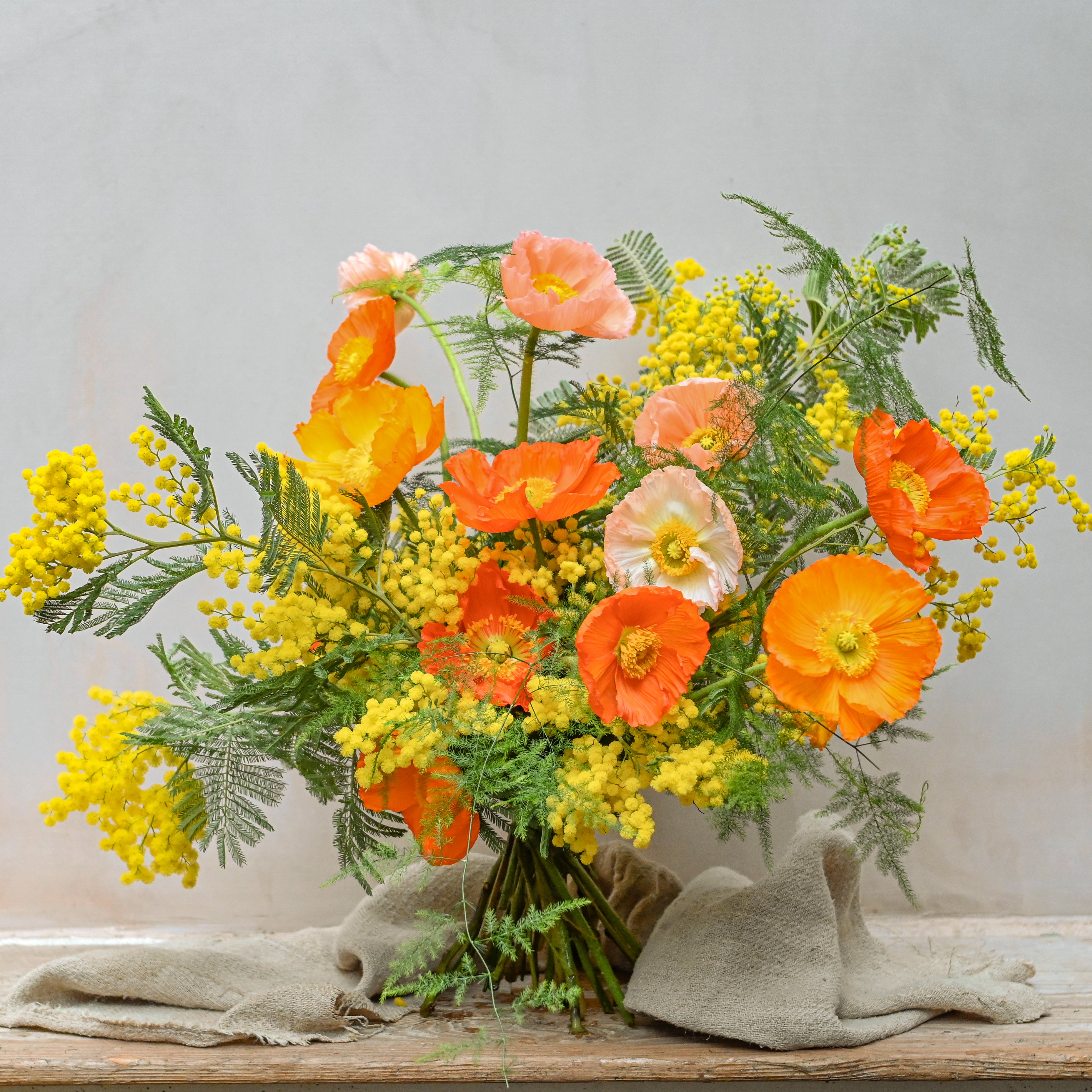 icelandic poppies and mimosa fresh flowers bouquet available for London & UK flower delivery