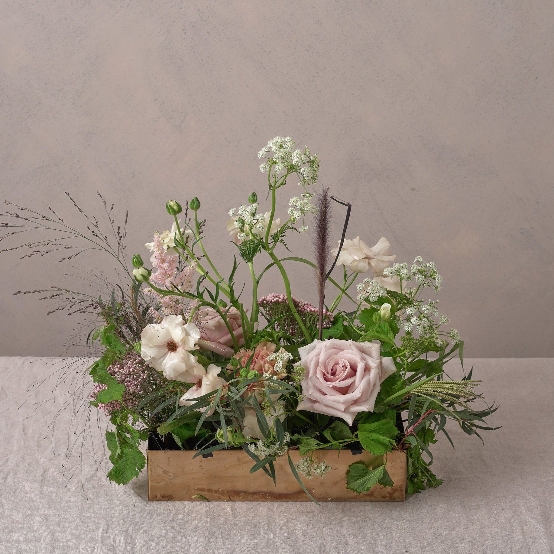 english country garden style trough arrangements for weddings
