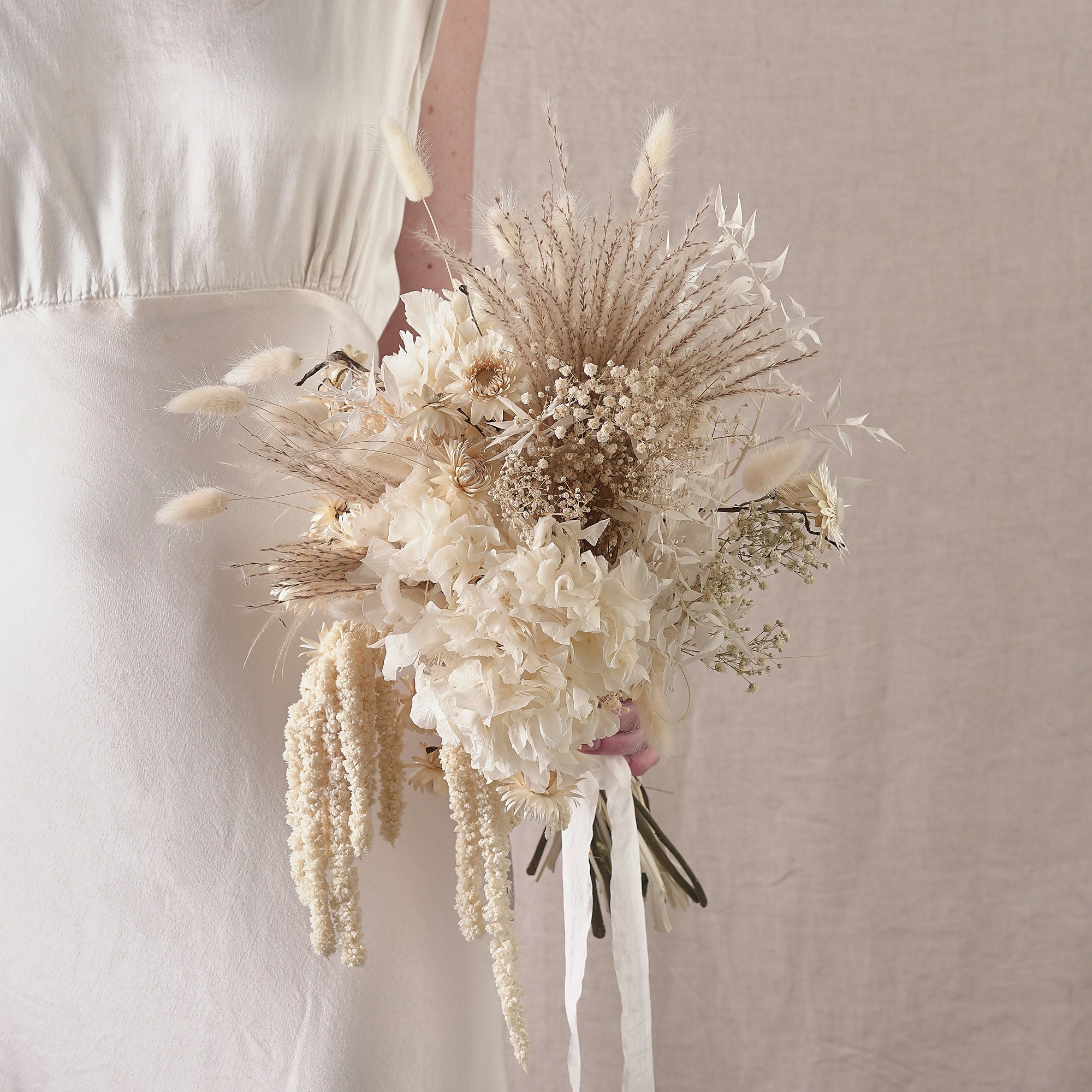 dried bridal bouquet with white, off-white and cream preserved flowers