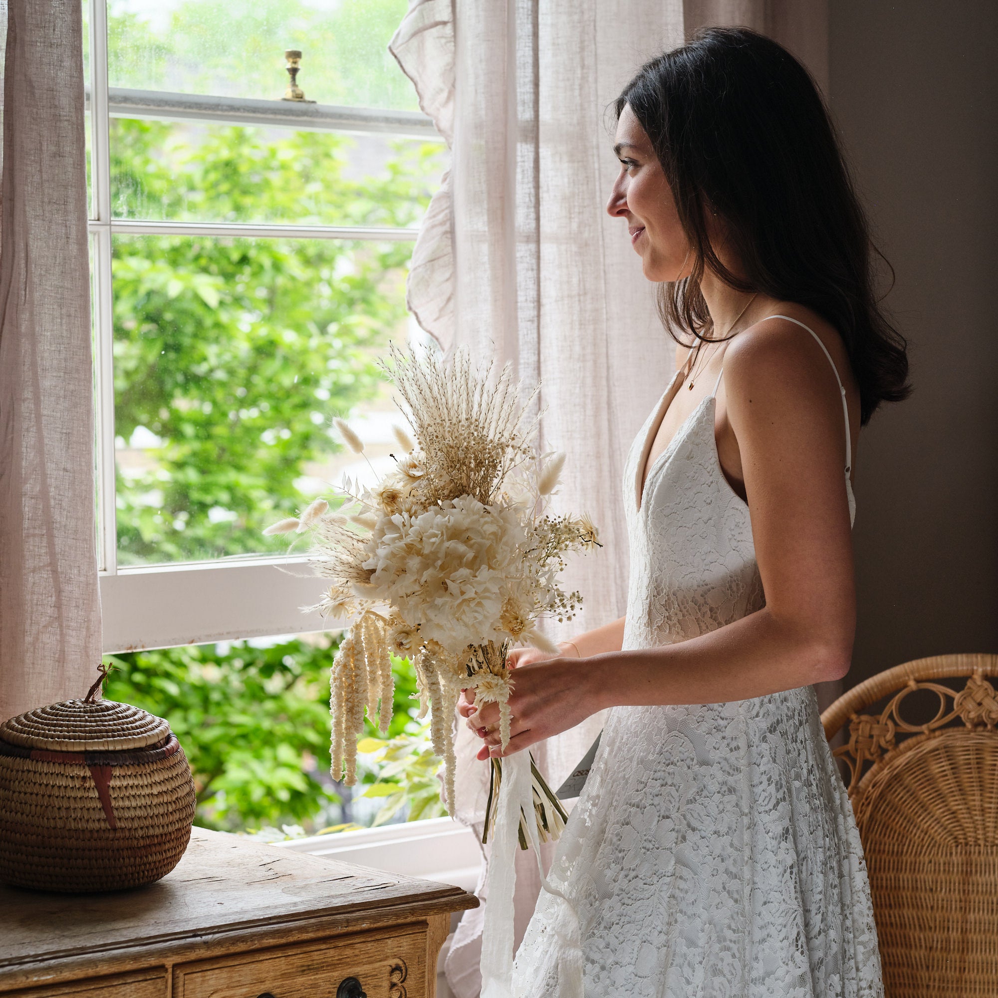 dried bridal bouquet with white, off-white and cream preserved flowers