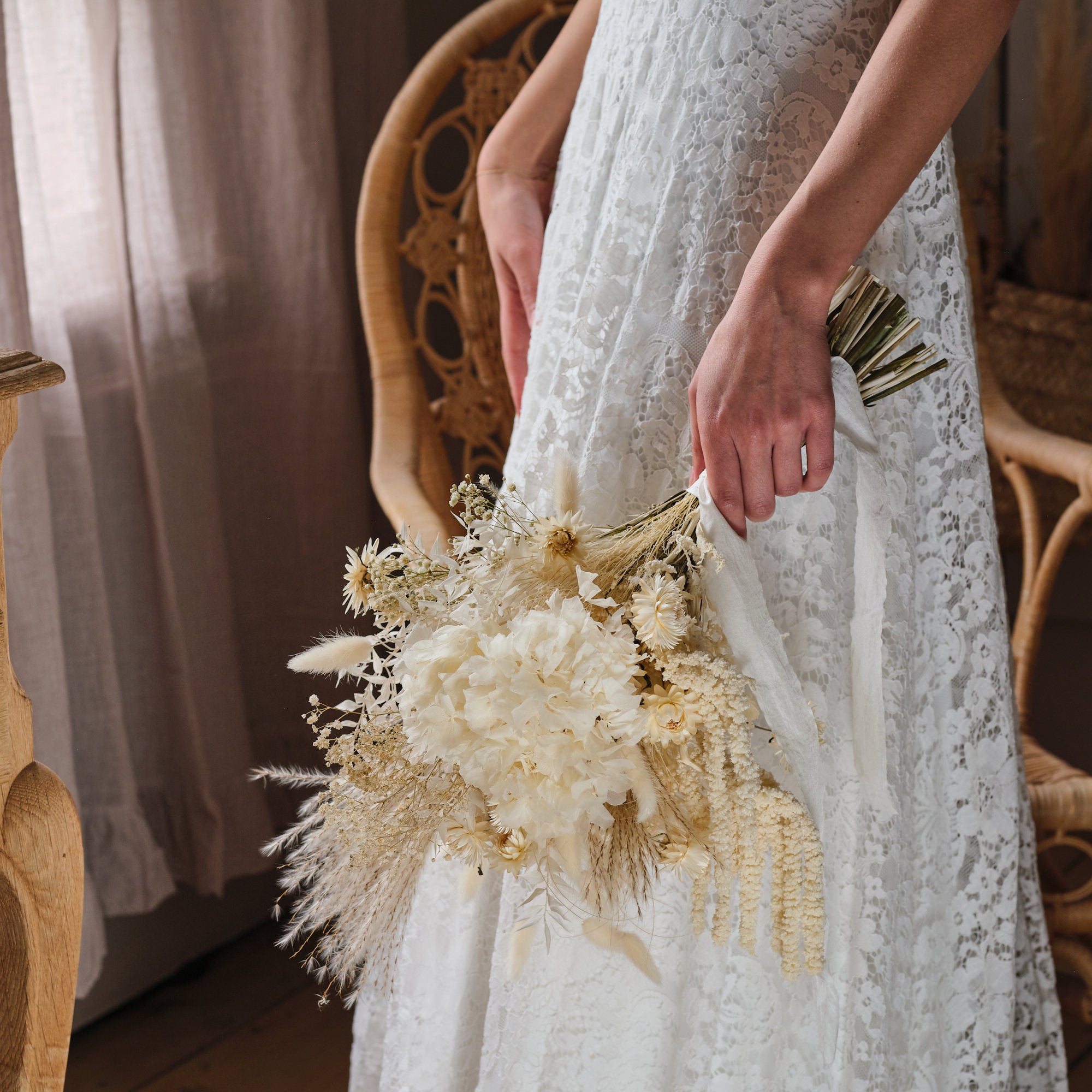 dried bridal bouquet with white, off-white and cream preserved flowers