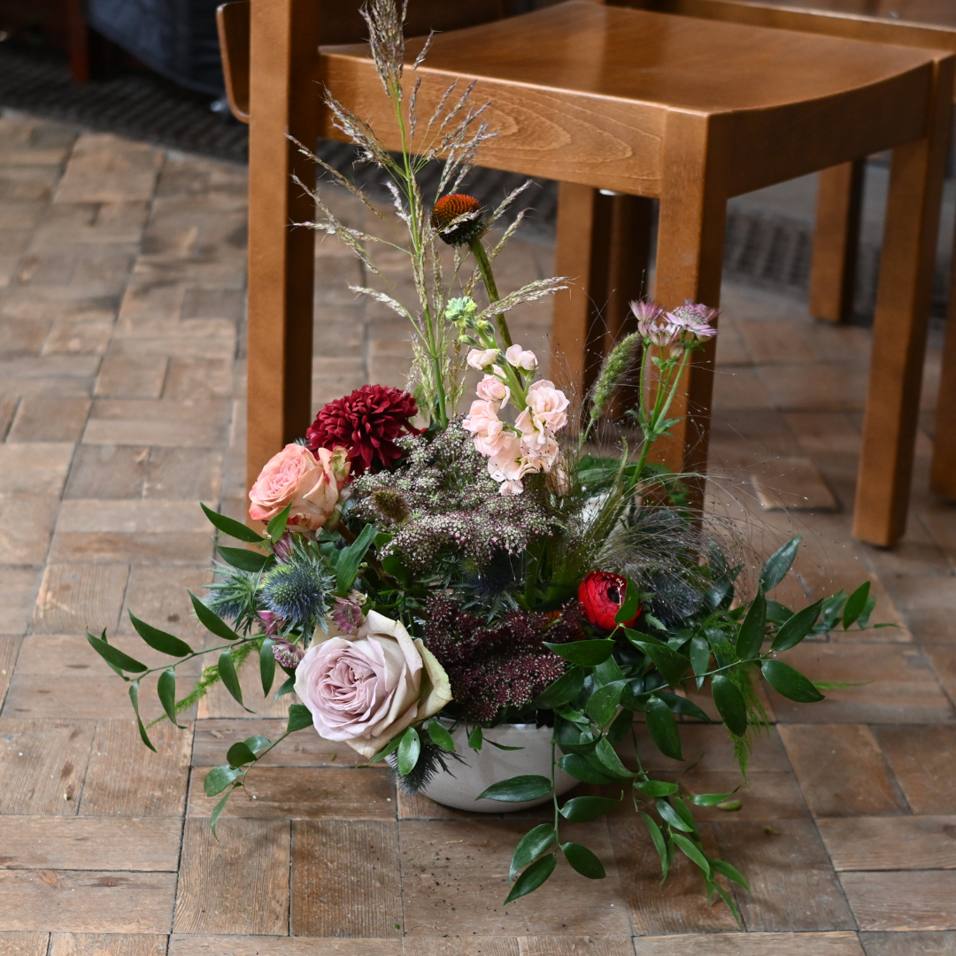 rustic burgundy cream and green wedding flowers in bowl arrangements