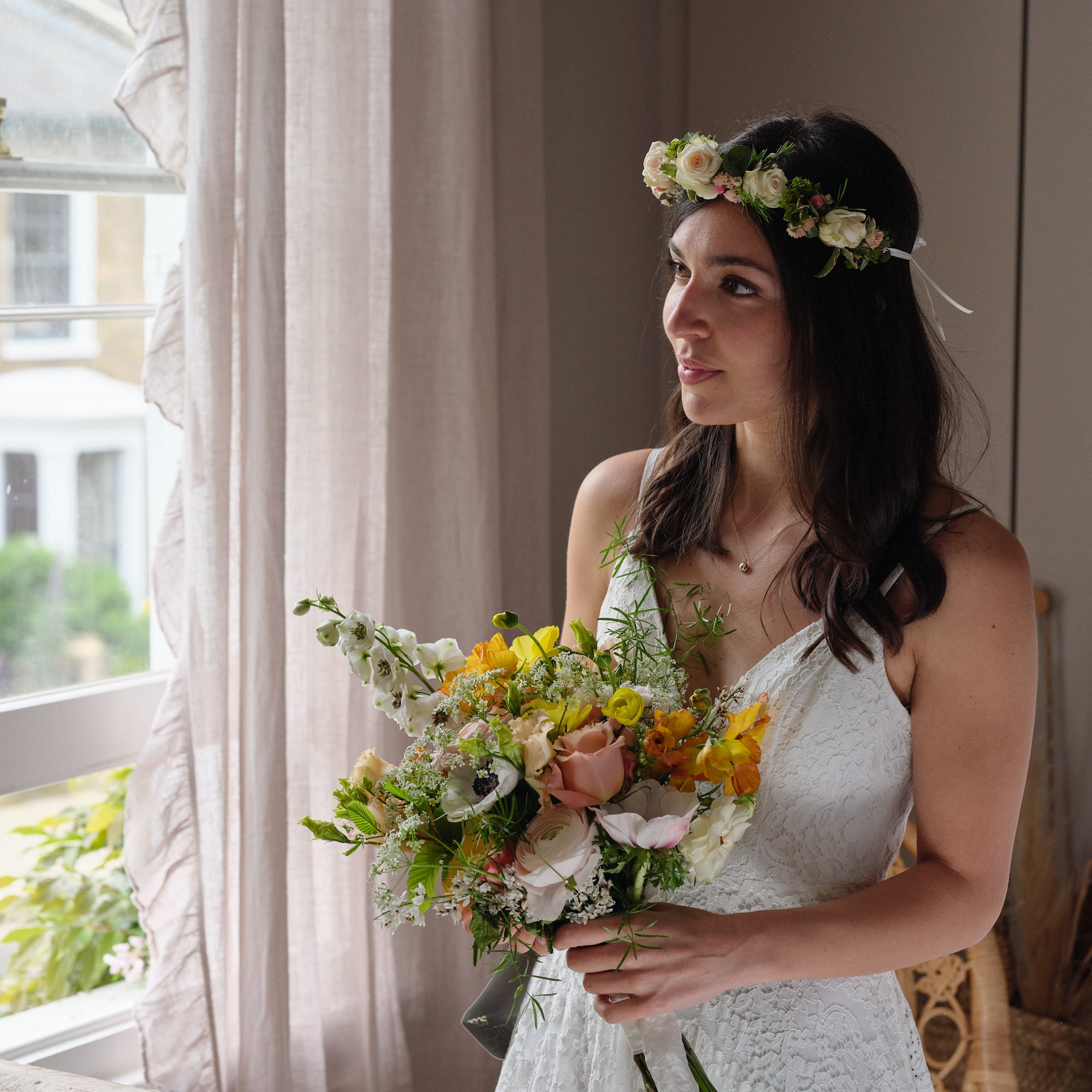 vibrant summery and colourful bridal bouquet with yellow green white and coral flowers by Botanique Workshop London