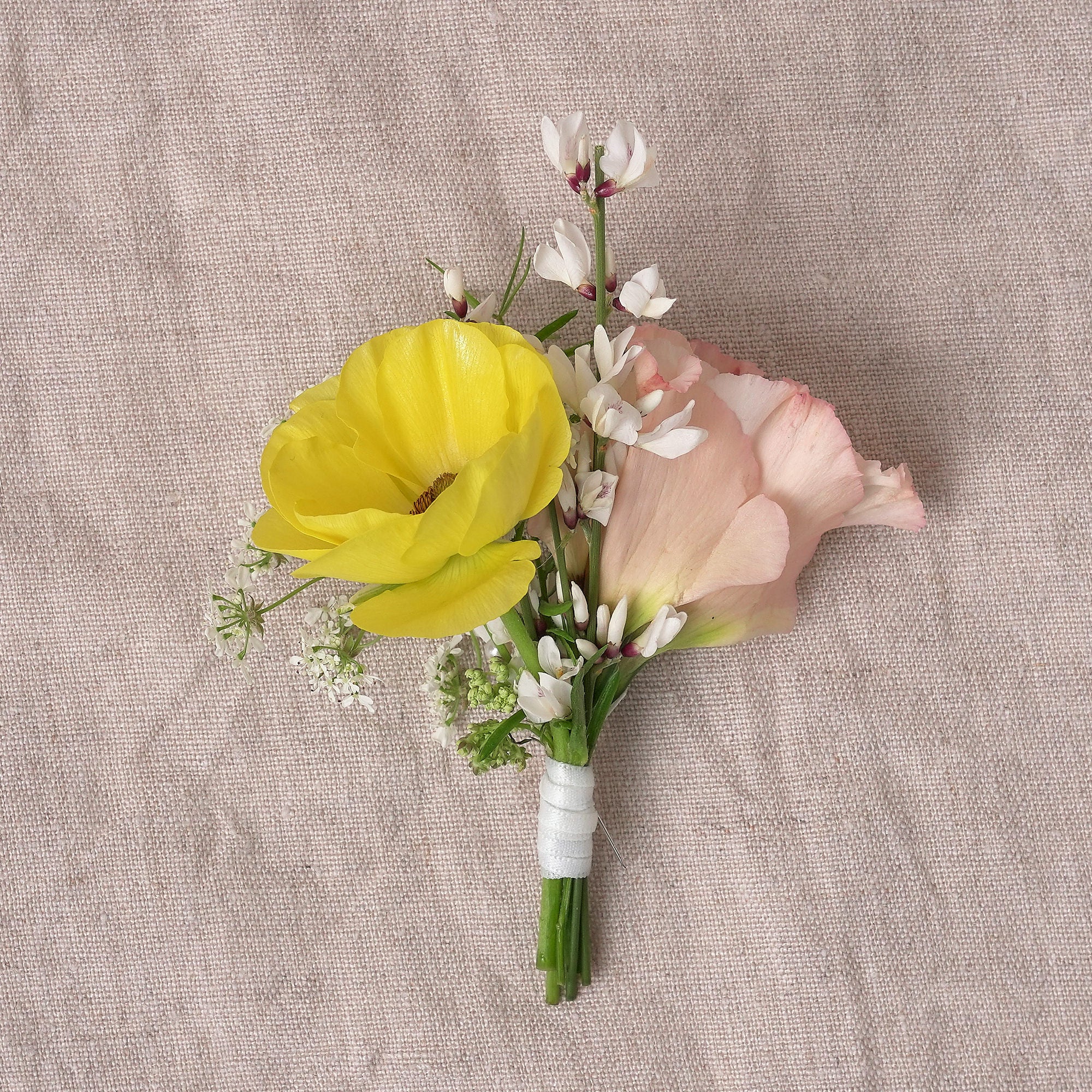 buttonholes and corsages for summer themed colourful wedding