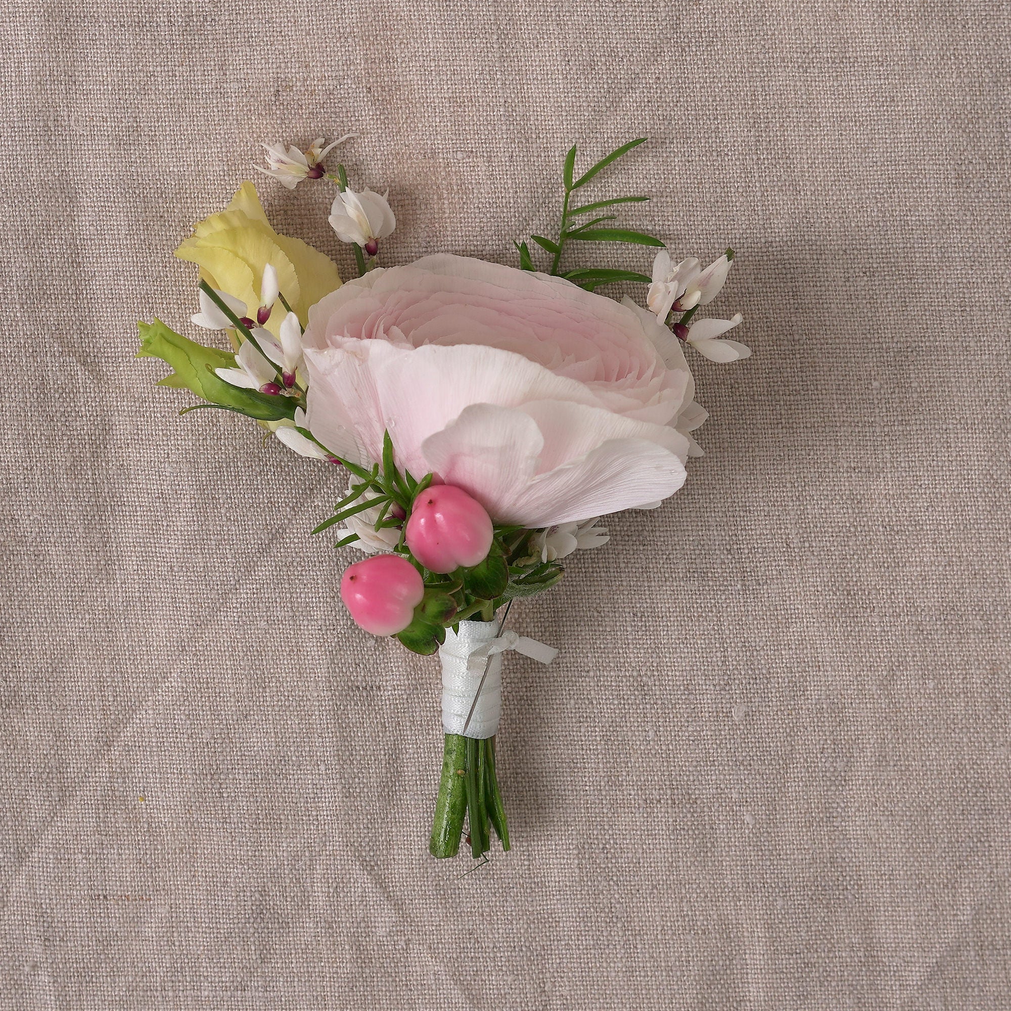 buttonholes and corsages for summer themed colourful wedding