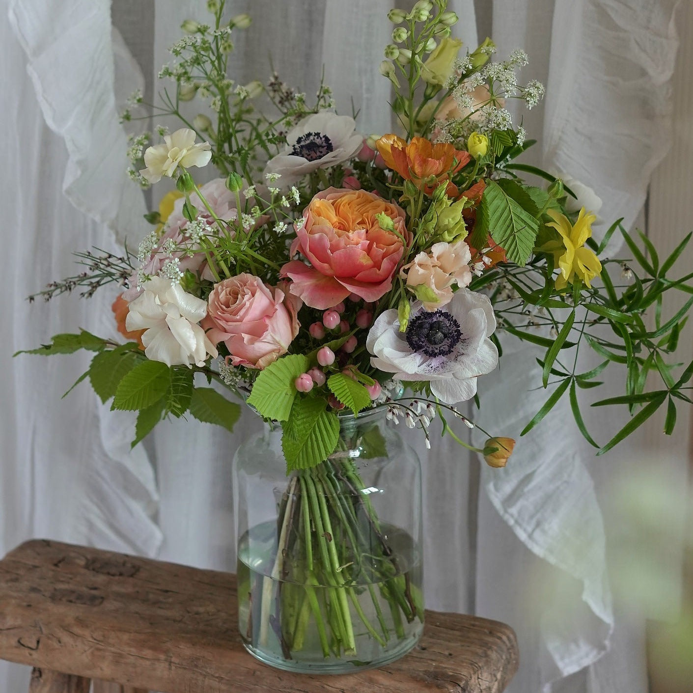 fresh and colourful vase arrangements for summer weddings by Botanique Workshop London
