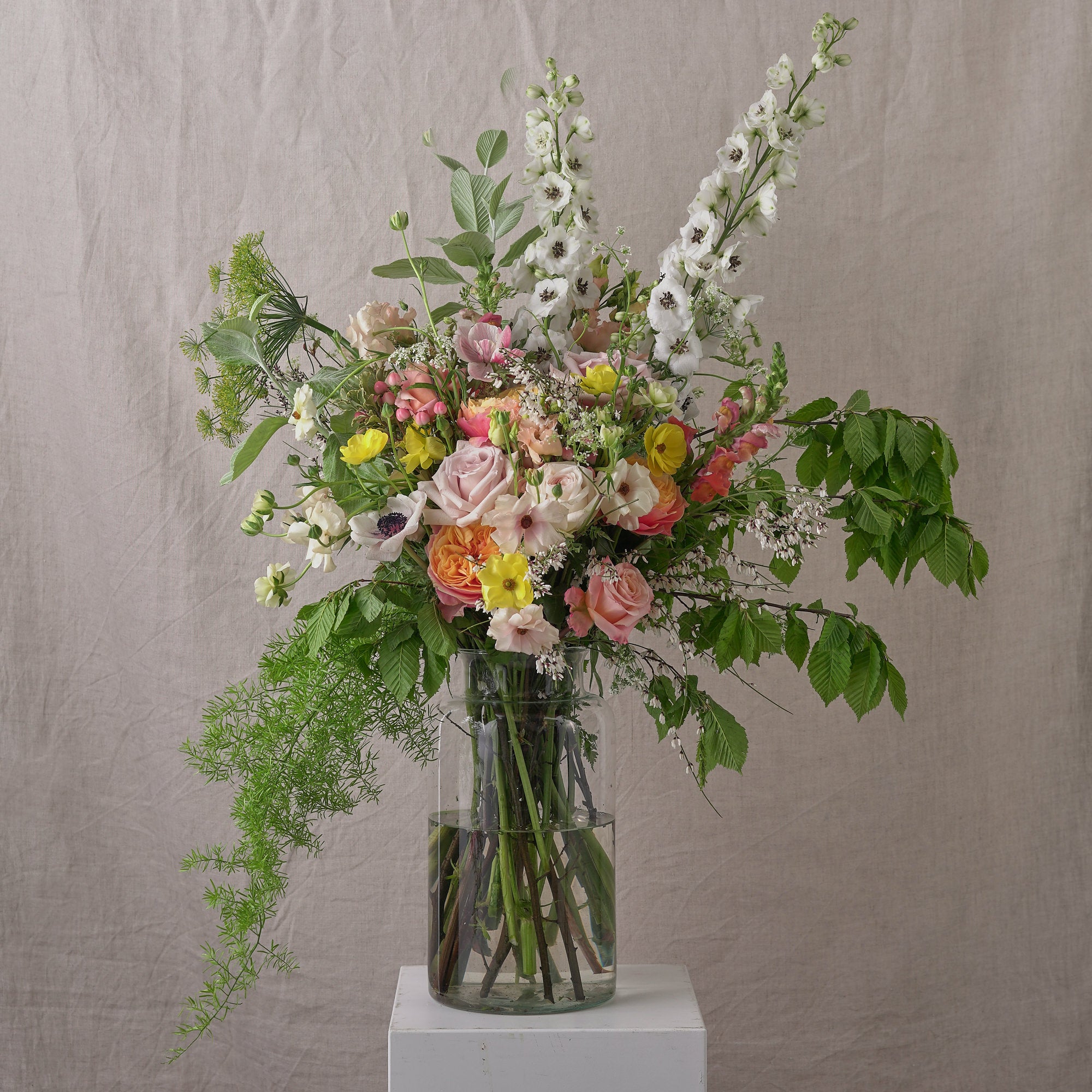 fresh and colourful vase arrangements for summer weddings by Botanique Workshop London