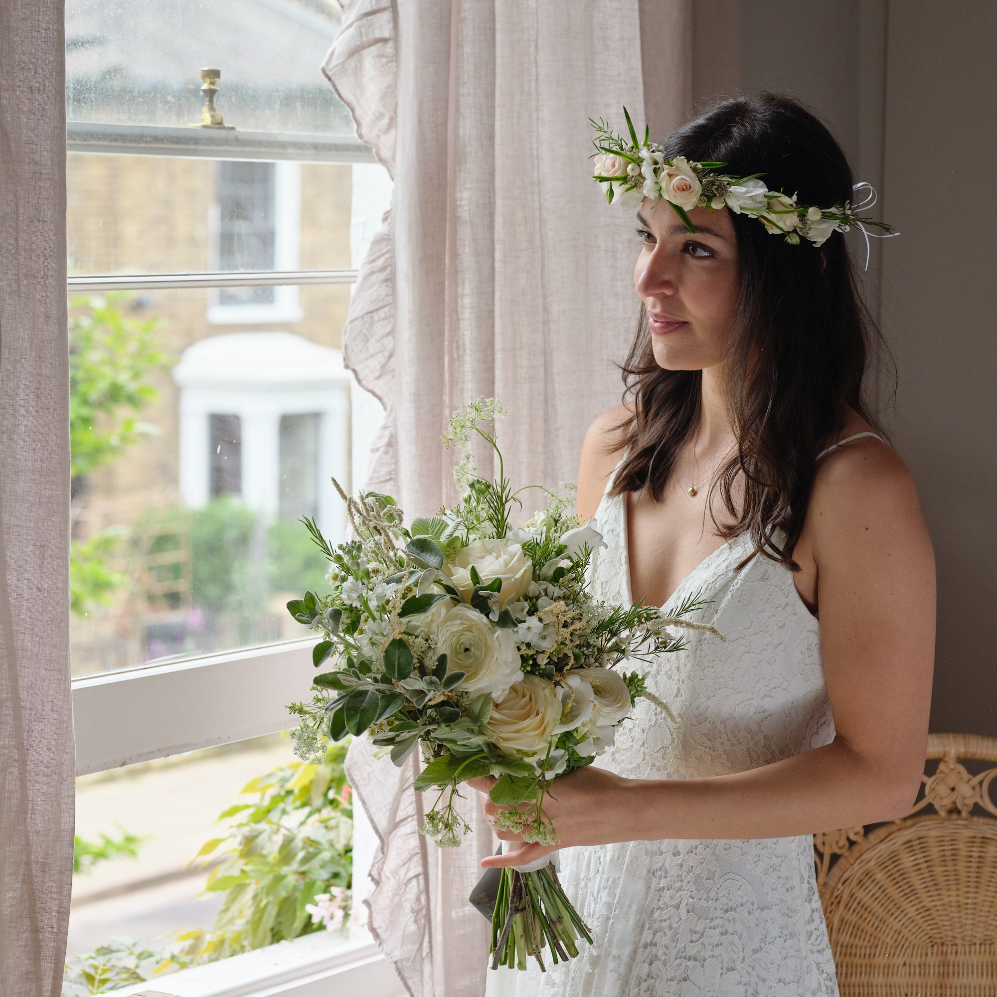 classic white bridal bouquet with white roses and fresh foliage by Botanique Workhshop London