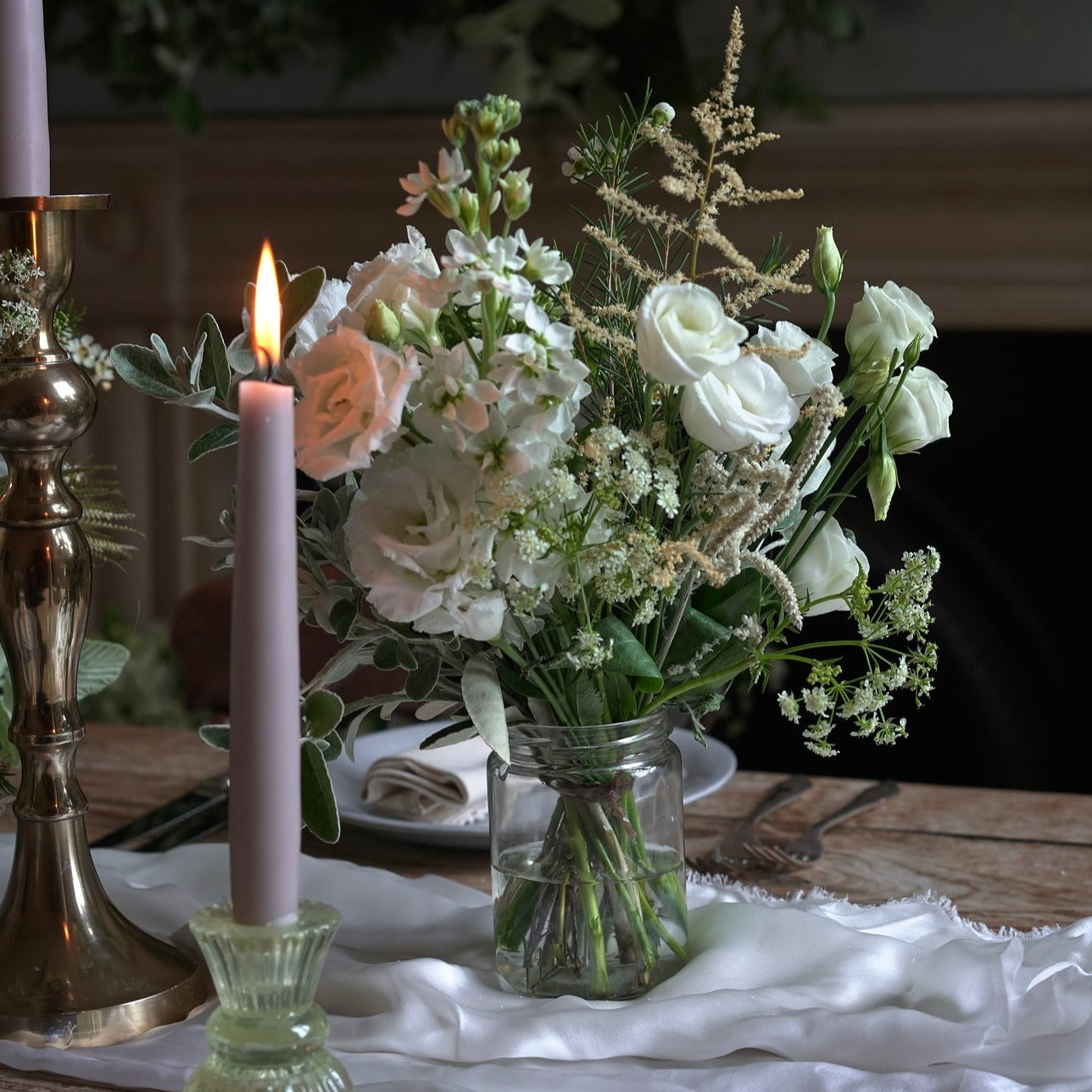 classic white table arrangements for weddings and events by Botanique Workshop London