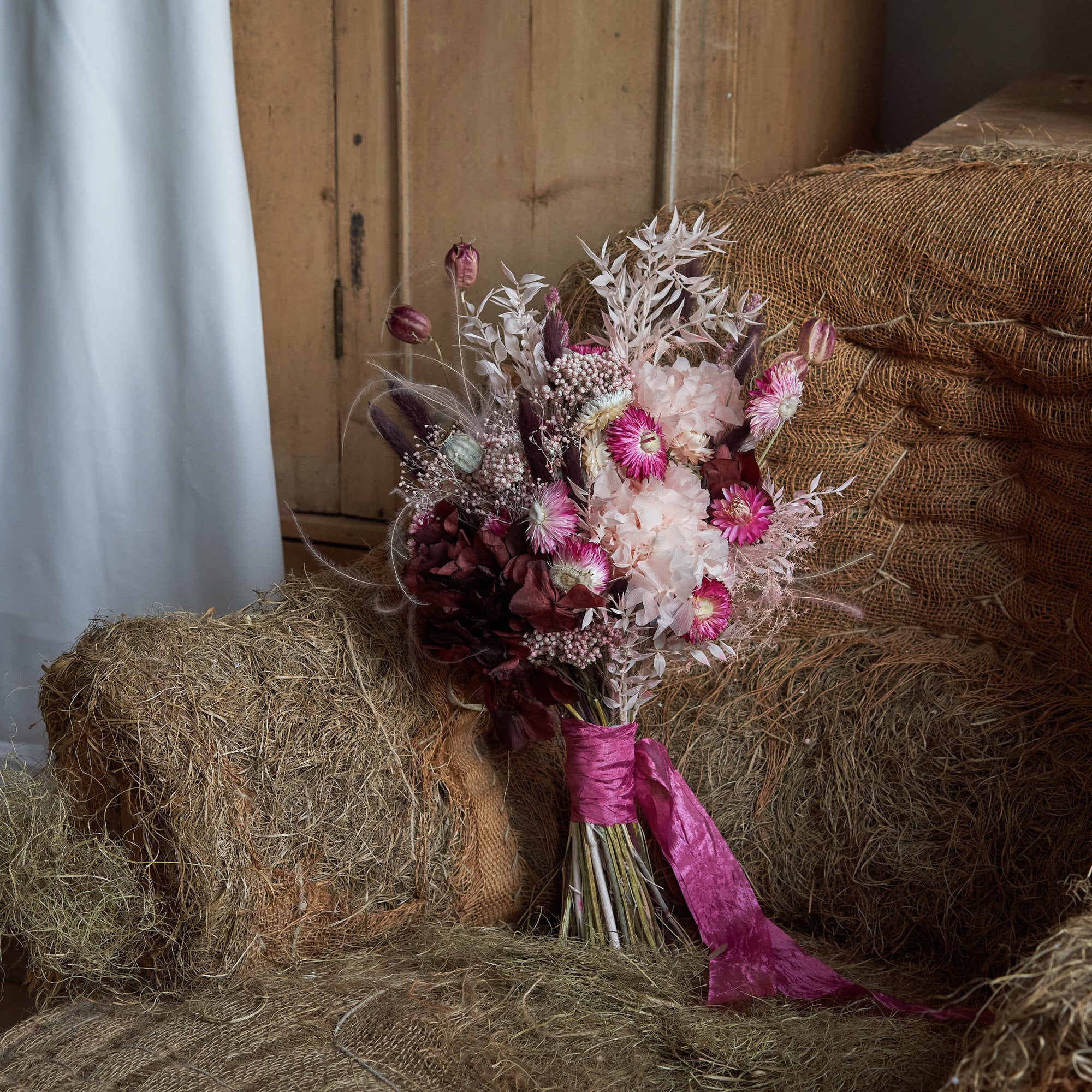 pink & burgundy dried flower bridal bouquet made with preserved flowers