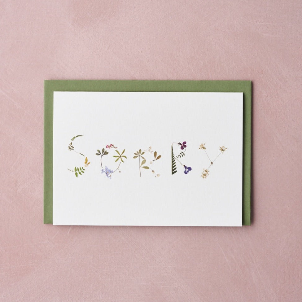"sorry" pressed flower design card